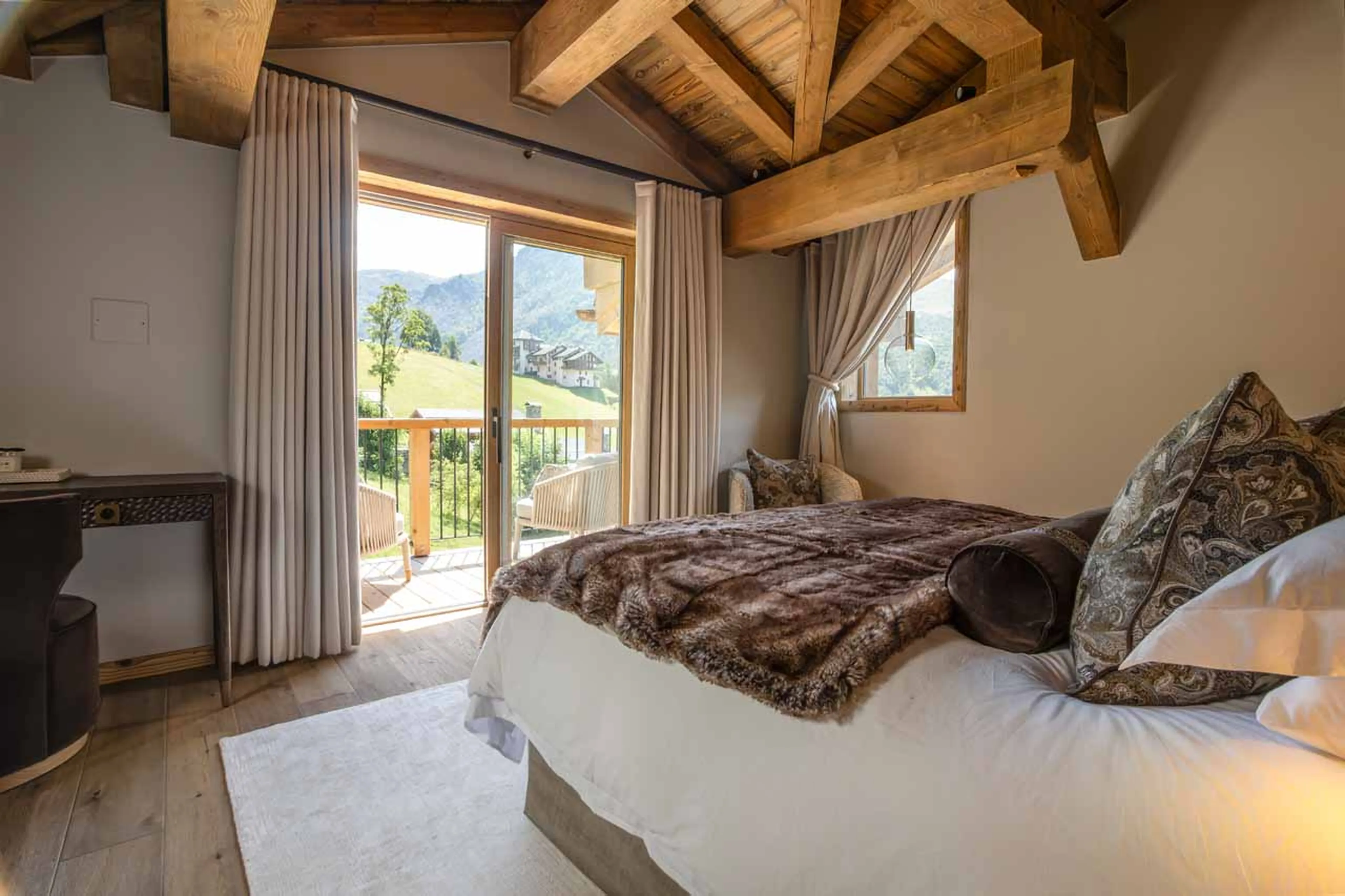 Bedroom 4 balcony access at Chalet Ilex in St Martin de Belleville