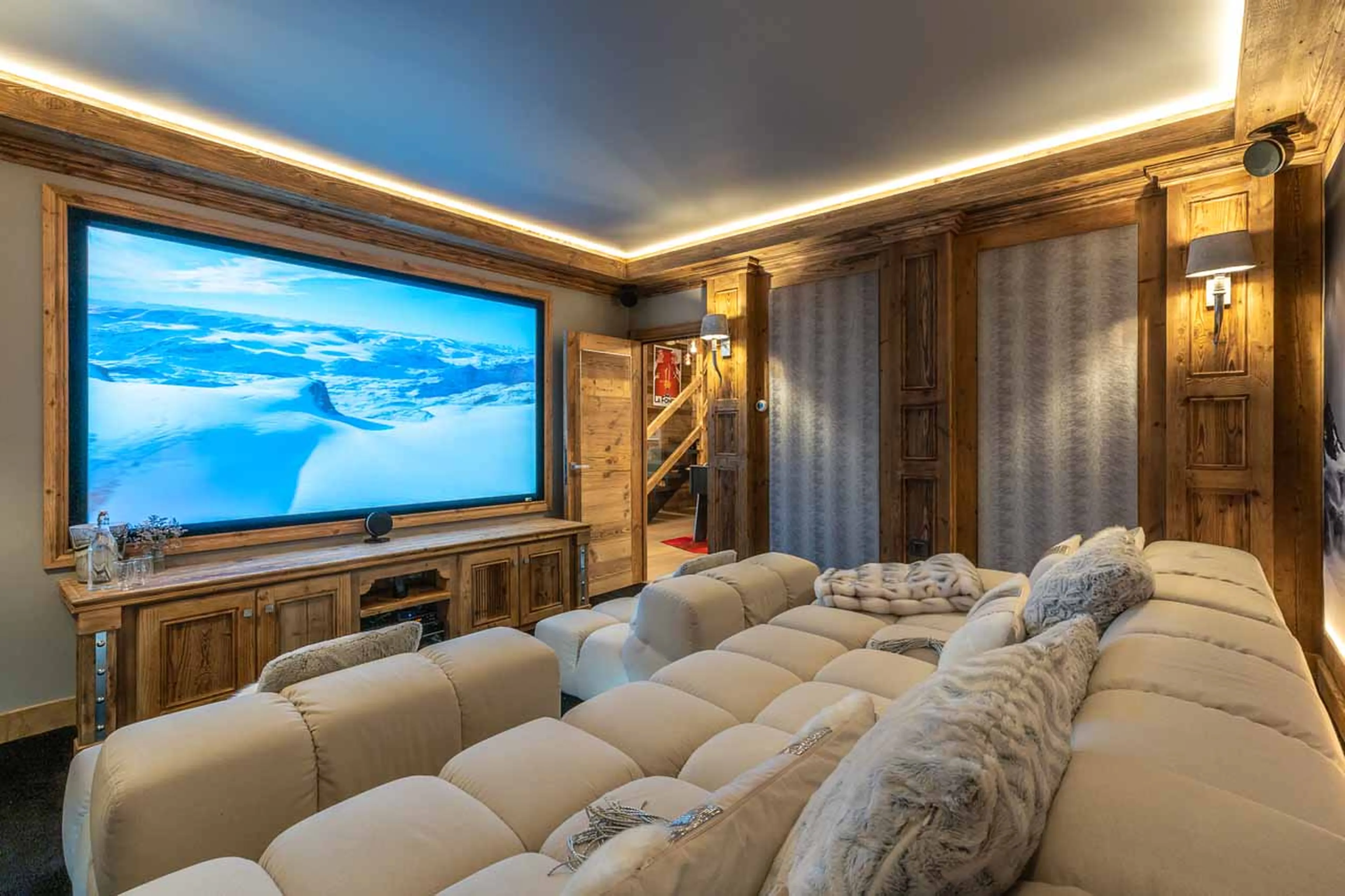 Cinema room seating and screen at Chalet Infinity in Chamonix