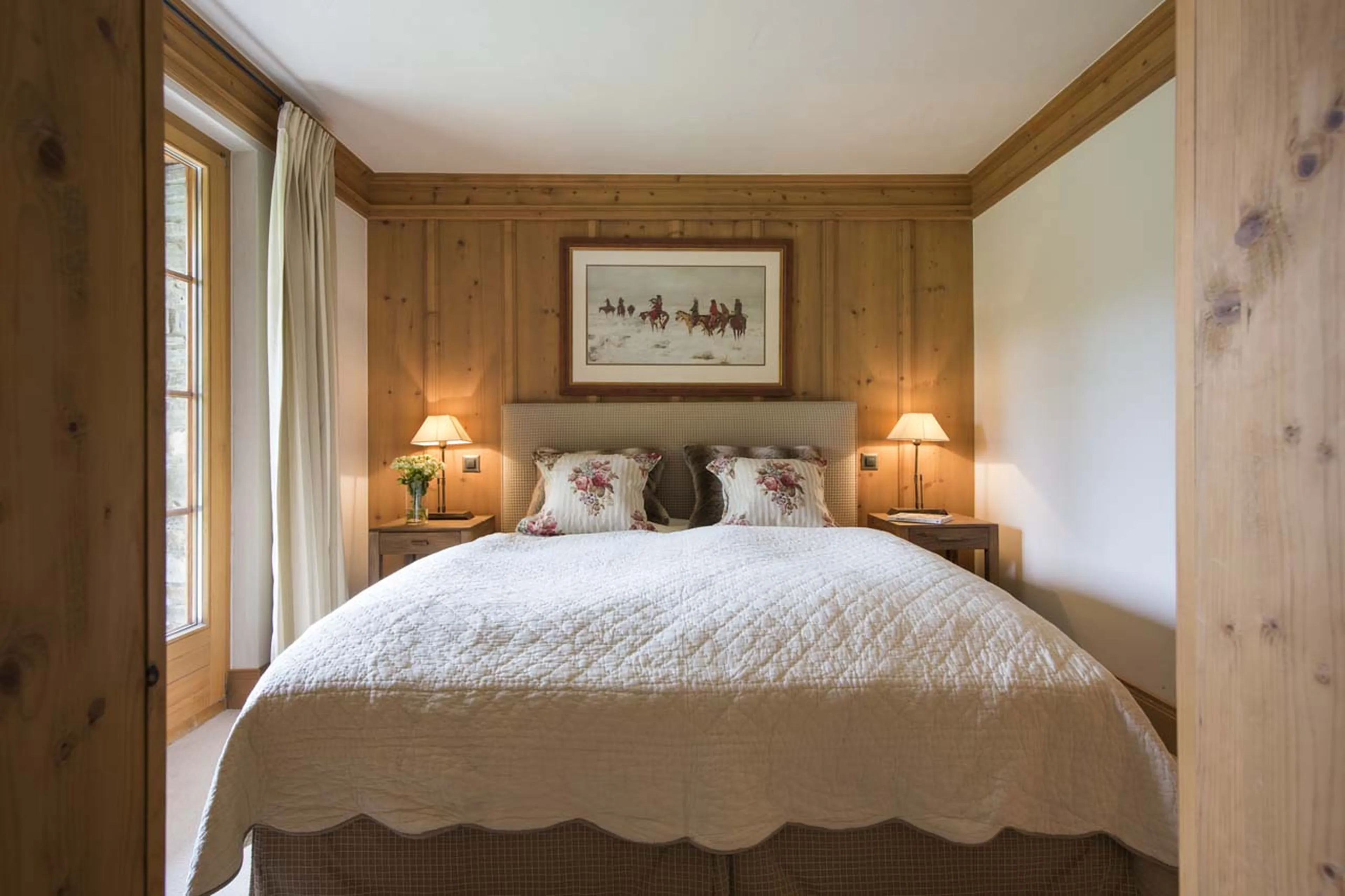 Bedroom two with garden access in Chalet Ivouette in Verbier