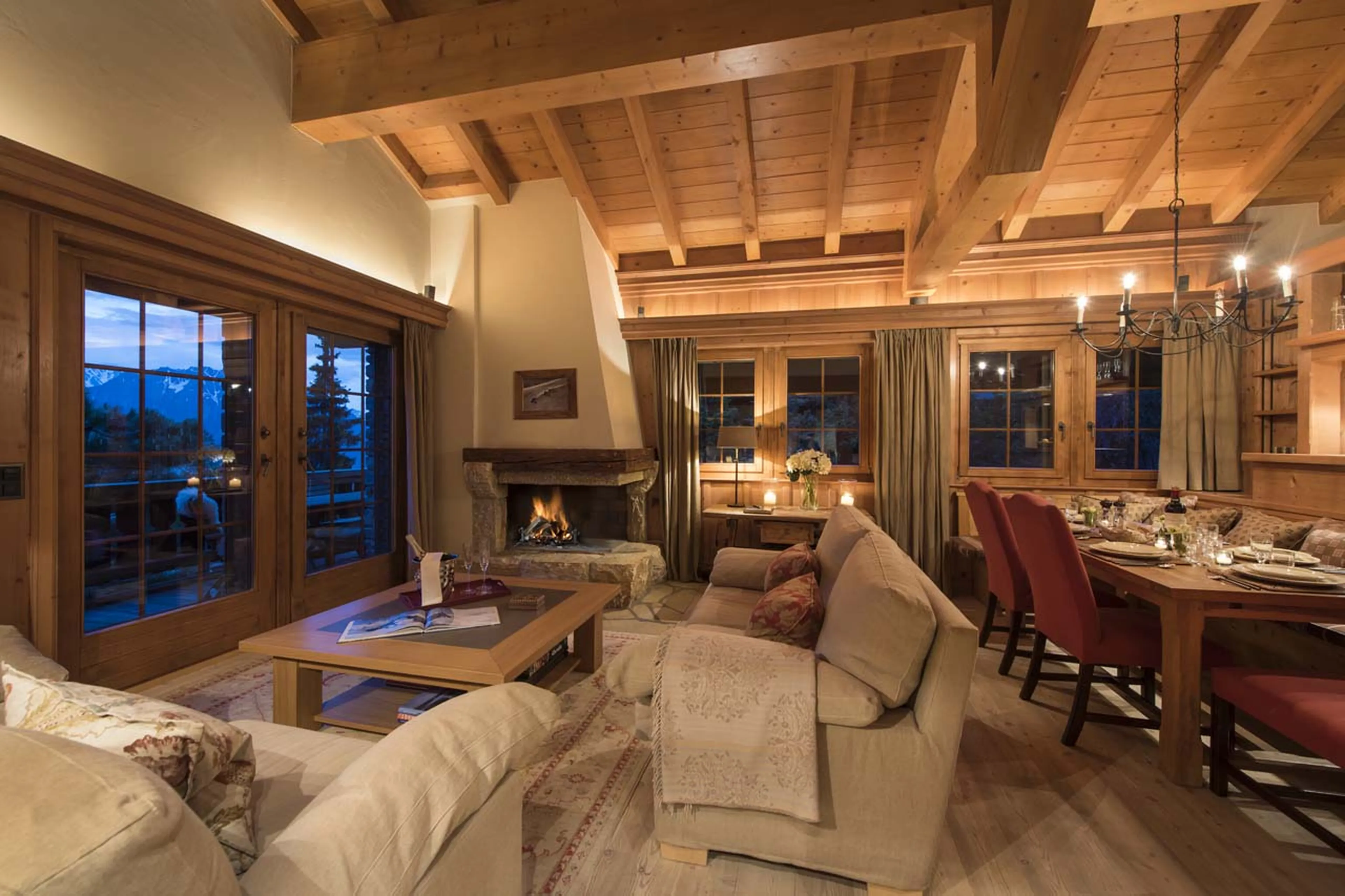 Living room at night in Chalet Ivouette in Verbier
