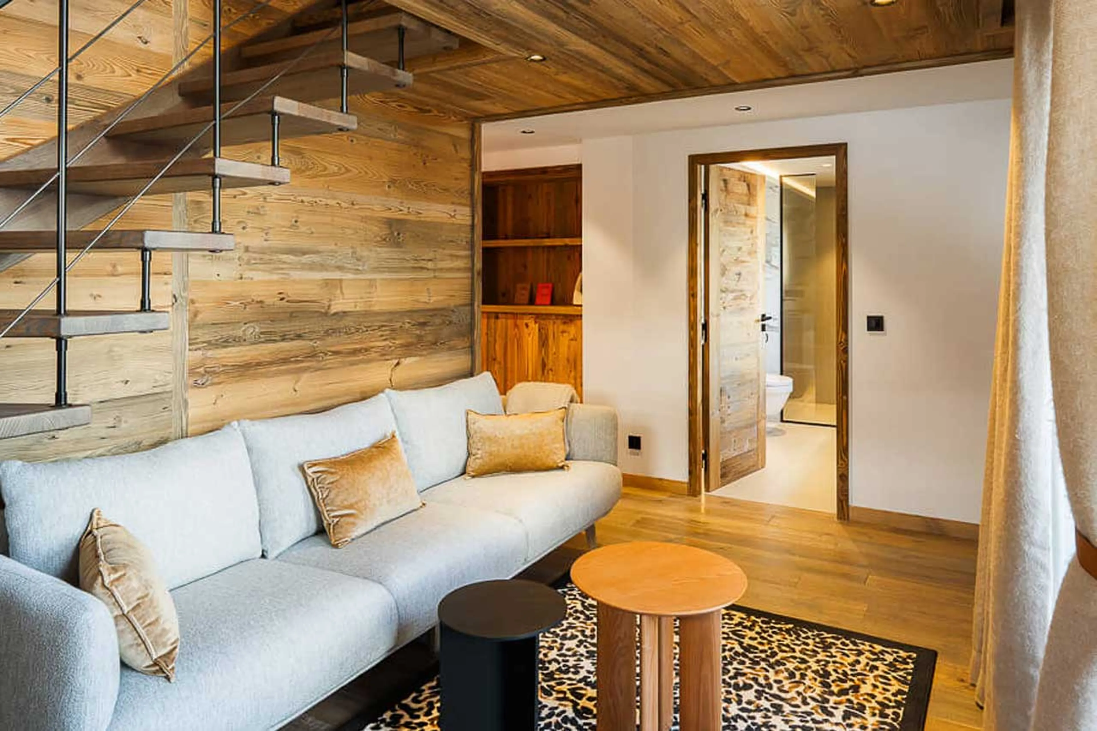 Bedroom 1 sitting area at Chalet J in Meribel