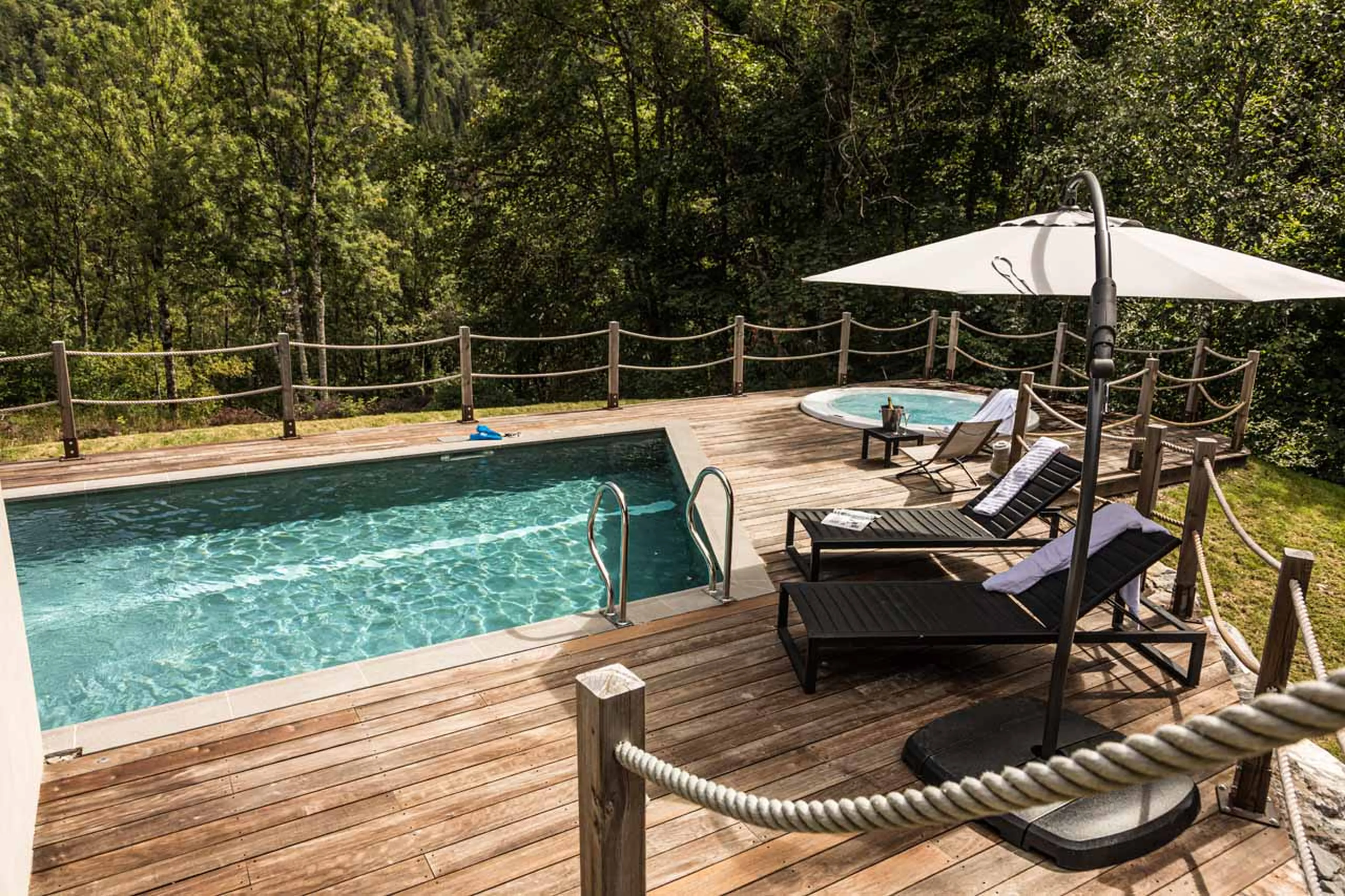 Outdoor pool at Chalet Joux Plane in Morzine in summer