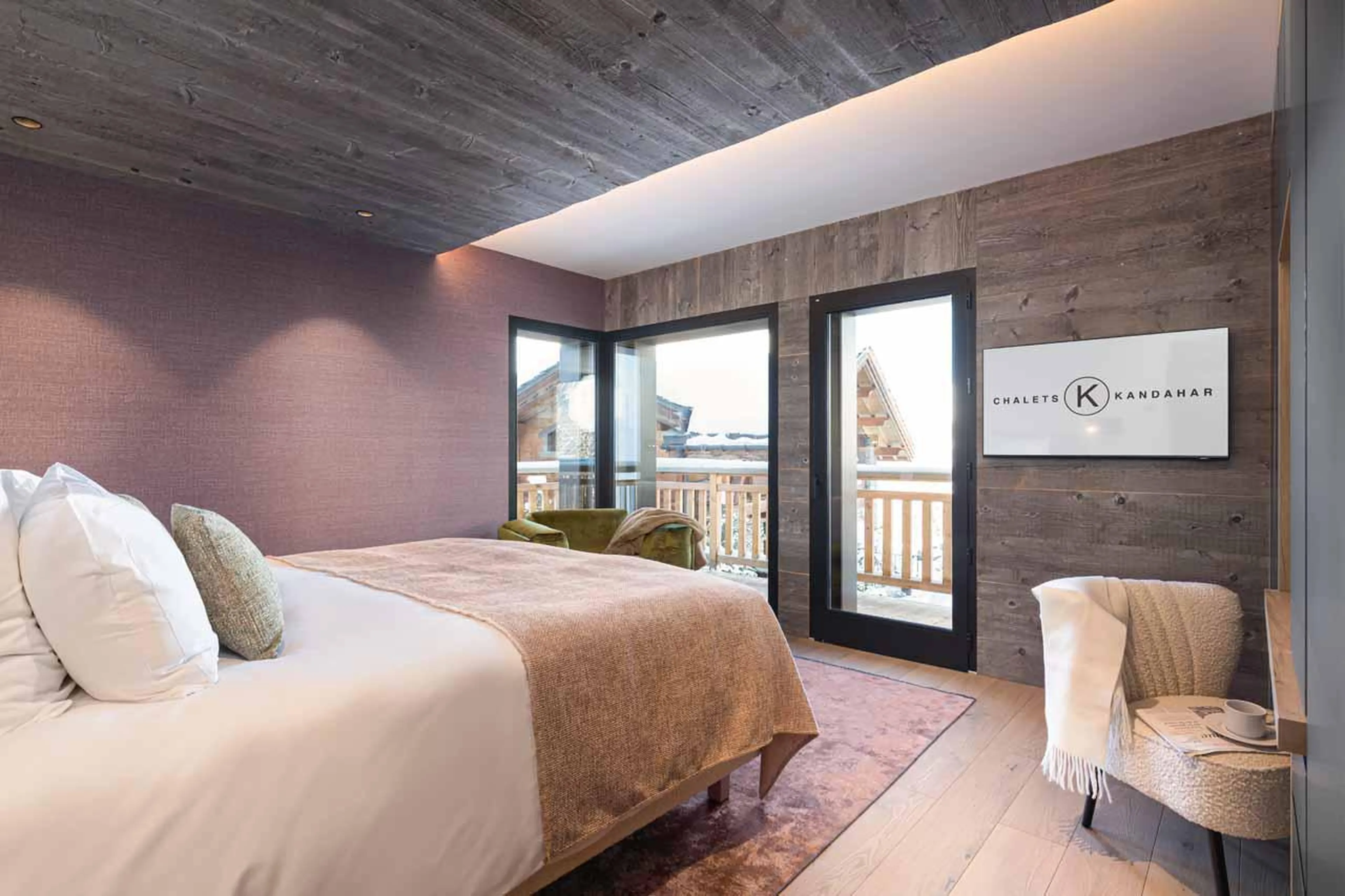 Double/twin bedroom with plentiful storage space at Chalet Kandahar in Courchevel 1550