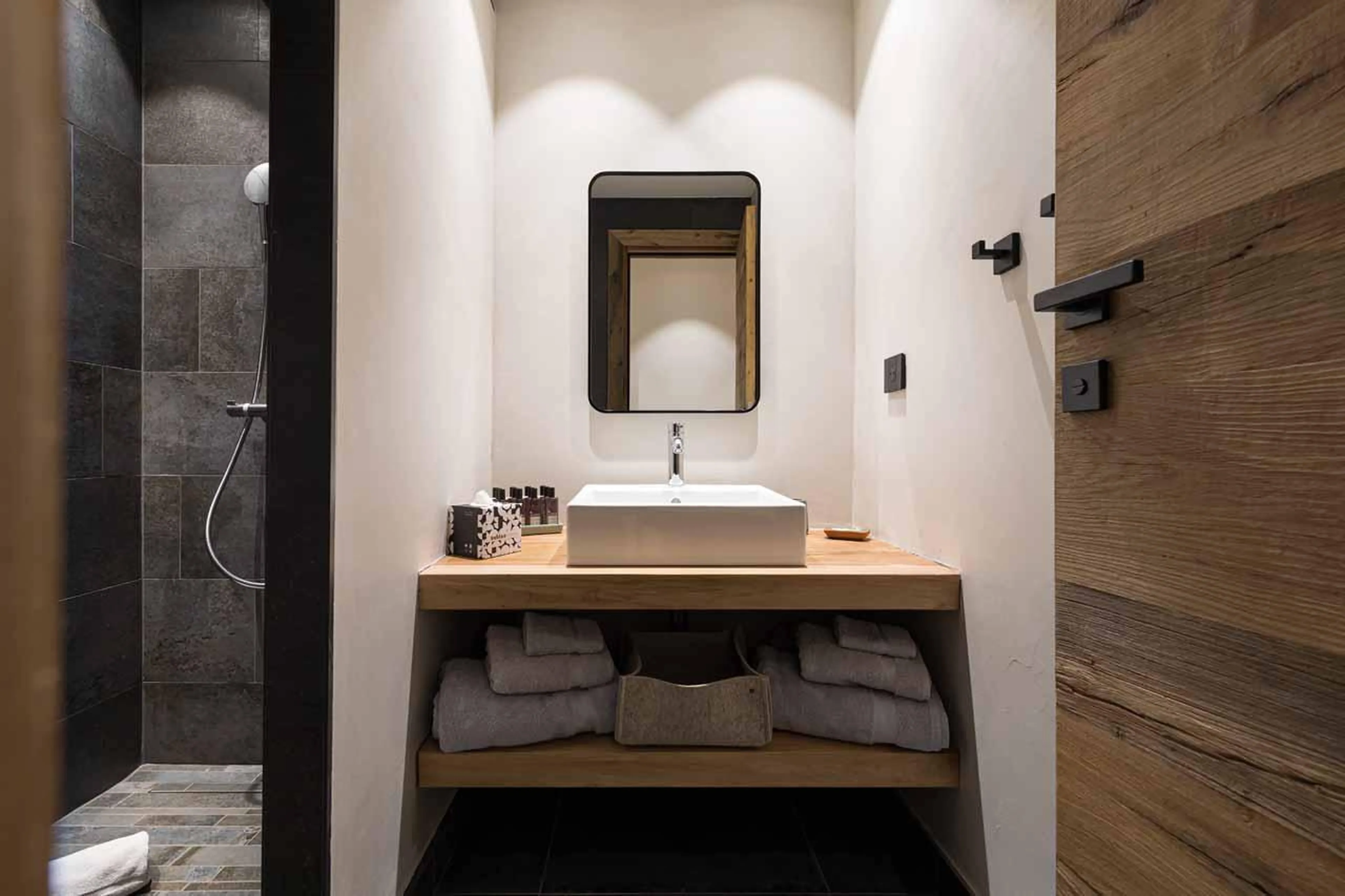 En-suite shower room with walk-in shower at Chalet Kandahar in Courchevel 1550