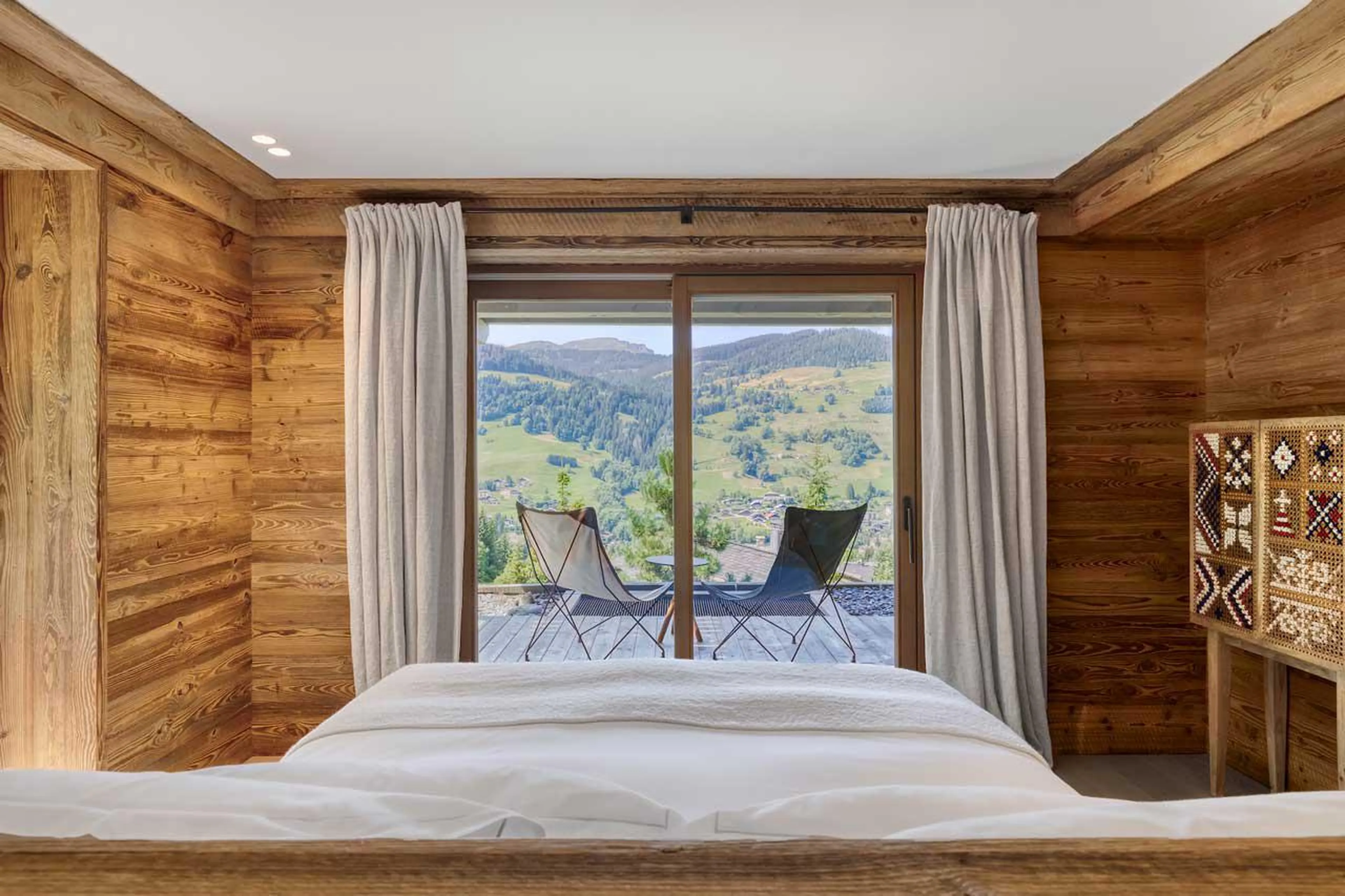 Large private terrace with mountain views at Chalet Kantaa in Megeve