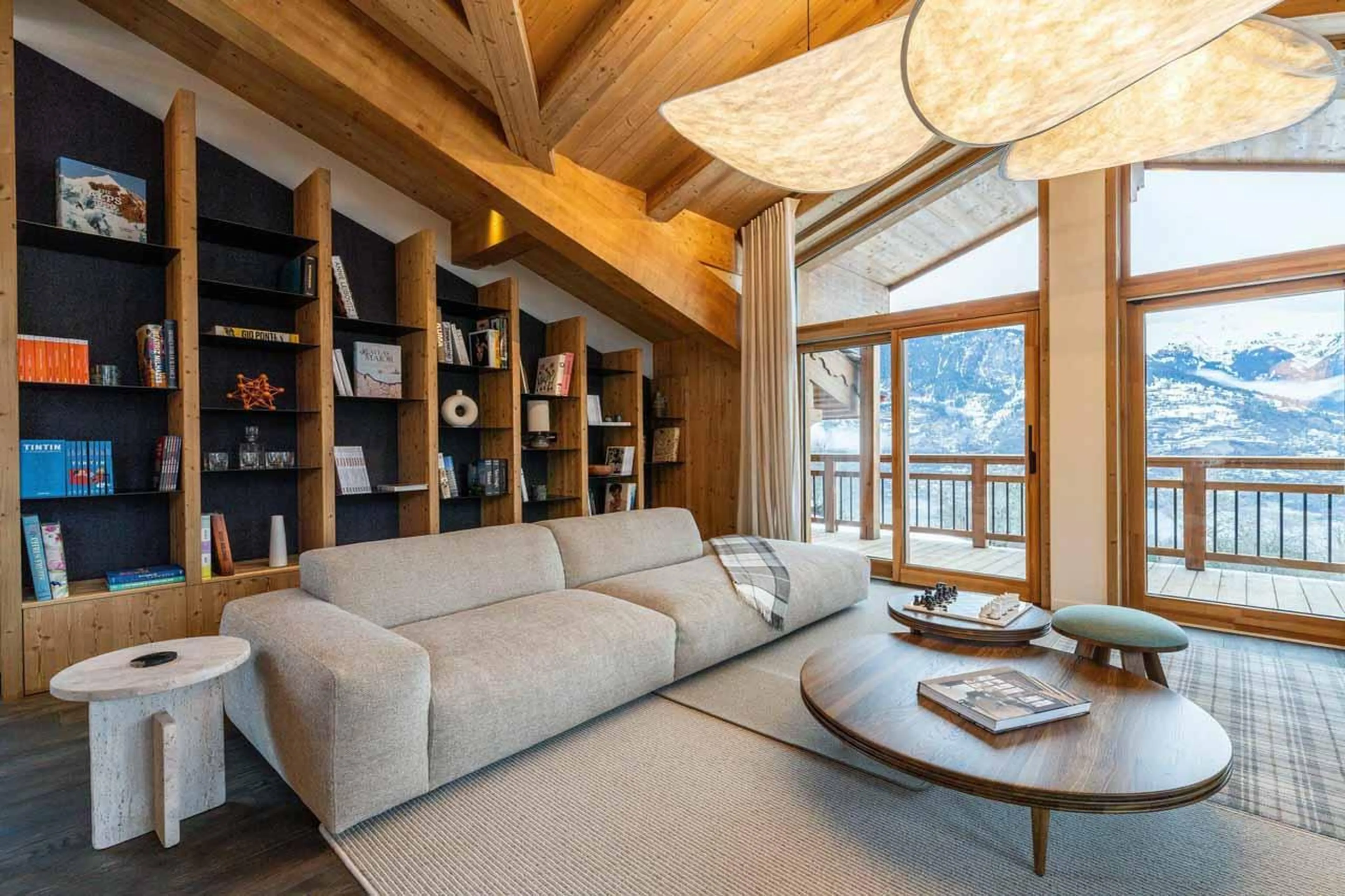 Sofa and book shelves in Chalet Khoton, Courchevel Le Praz