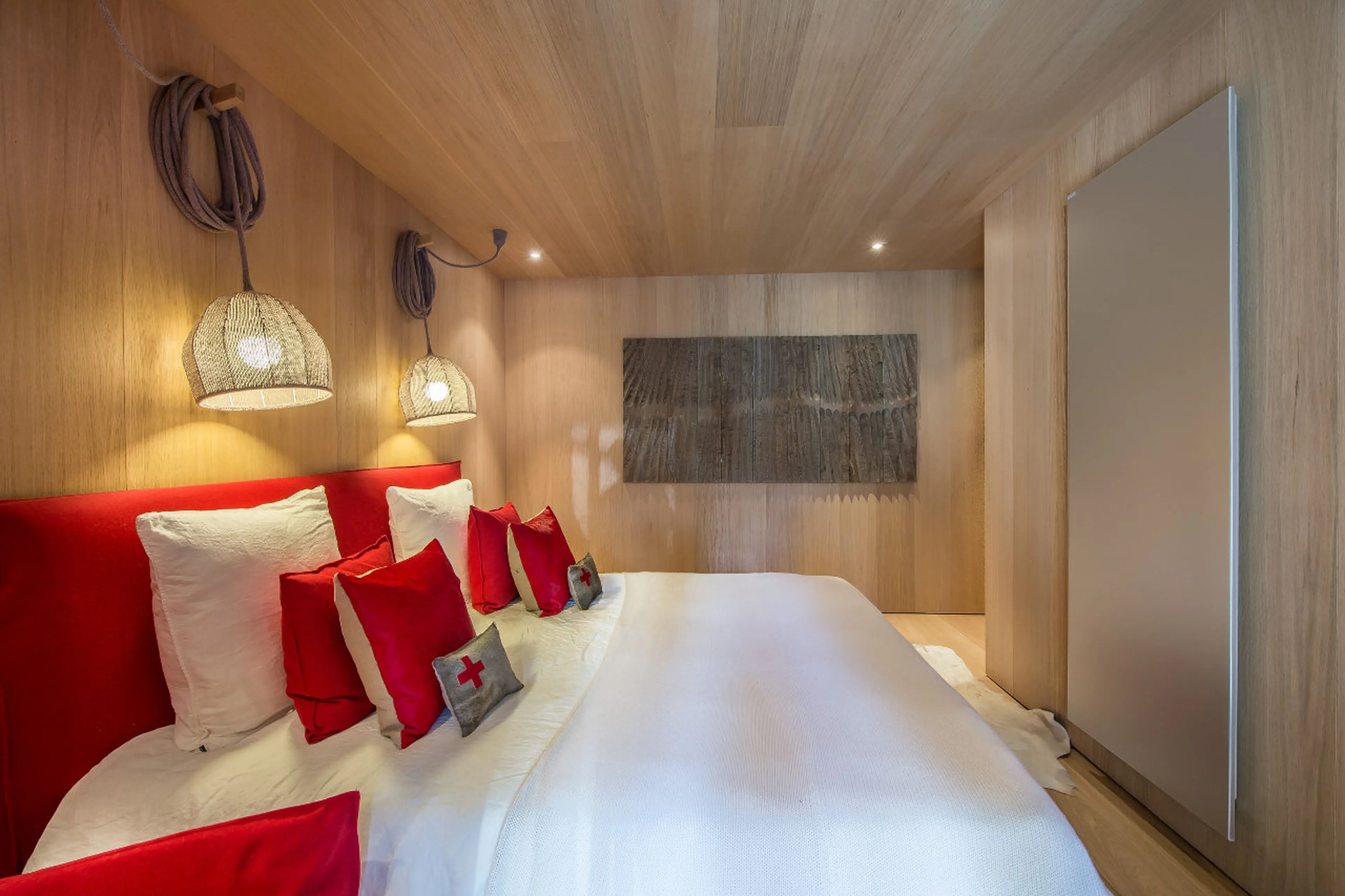 Bedroom has direct patio access in Chalet Kibo in Courchevel 1550