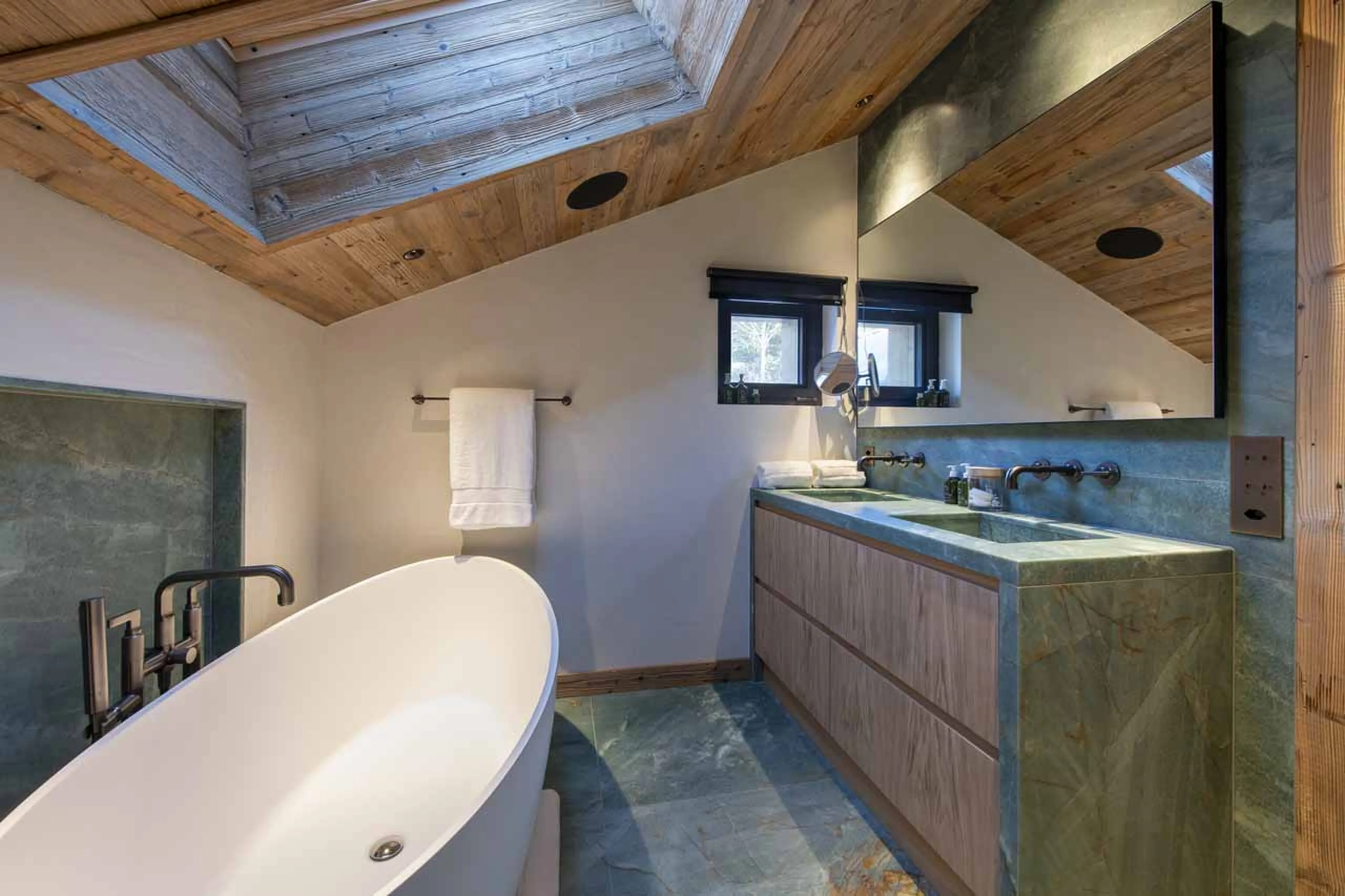 Bathroom with freestanding bath in Chalet Kitsilano, Verbier