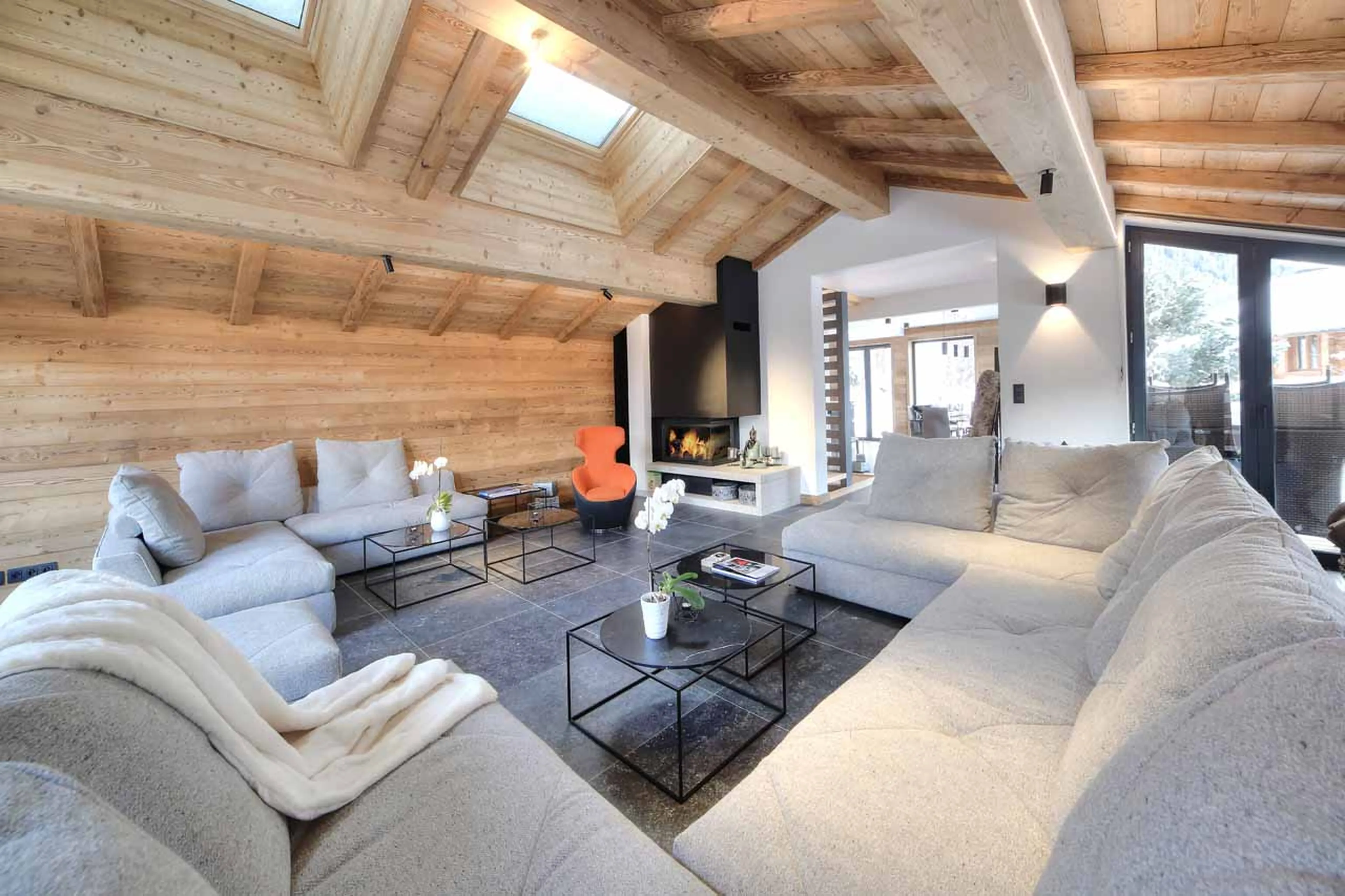 Fireplace in living area at Chalet Kuma in Chamonix