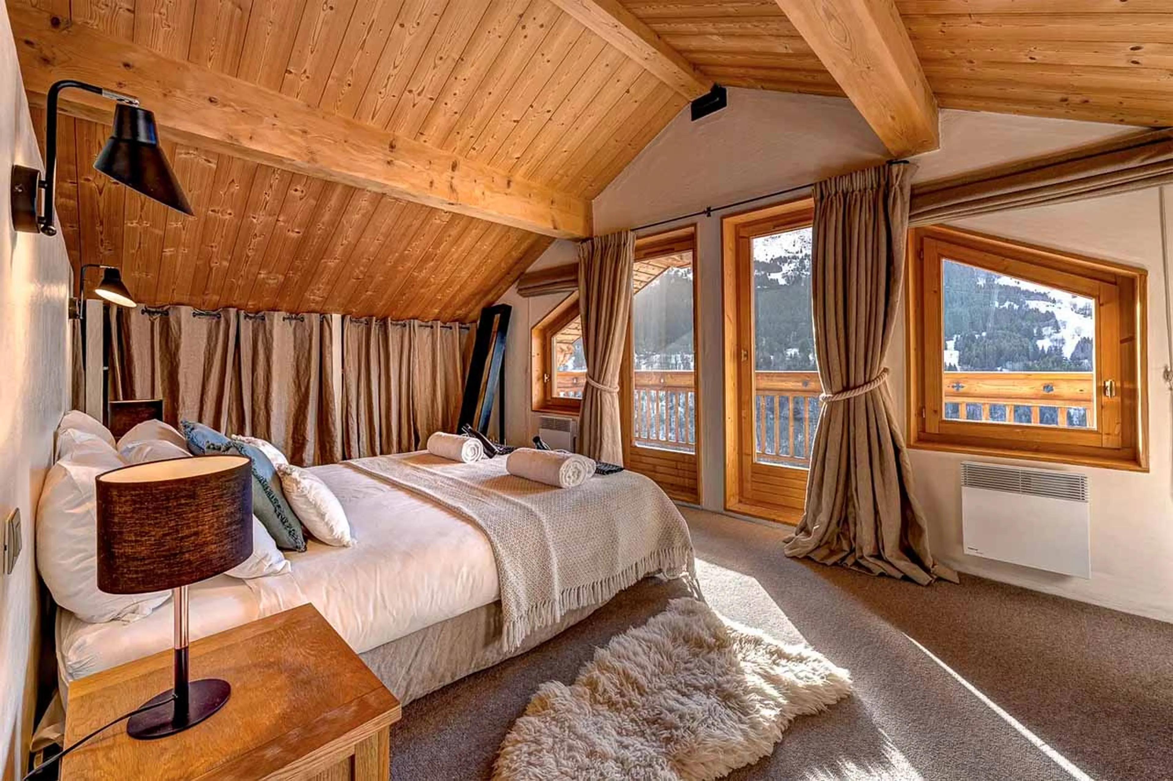 Spacious master suite at Chalet La Chouette in Meribel