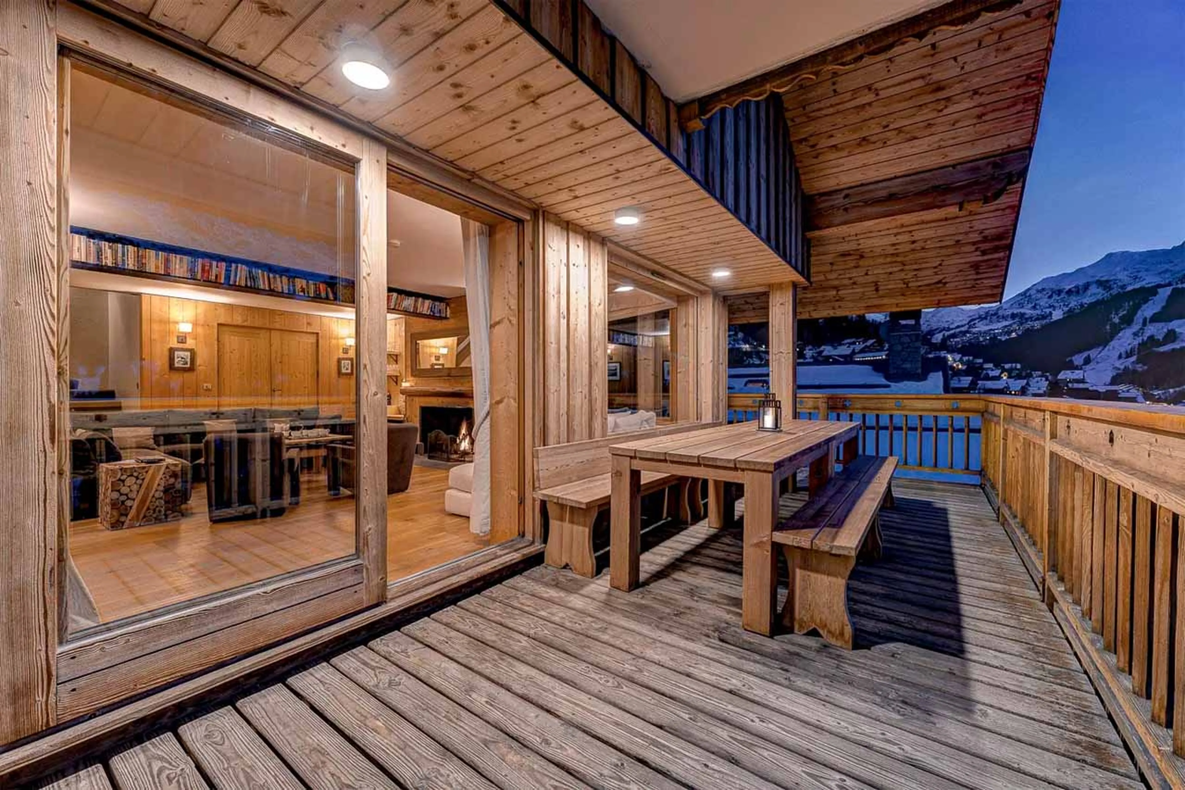 Sun terrace with hot tub at Chalet La Chouette in Meribel