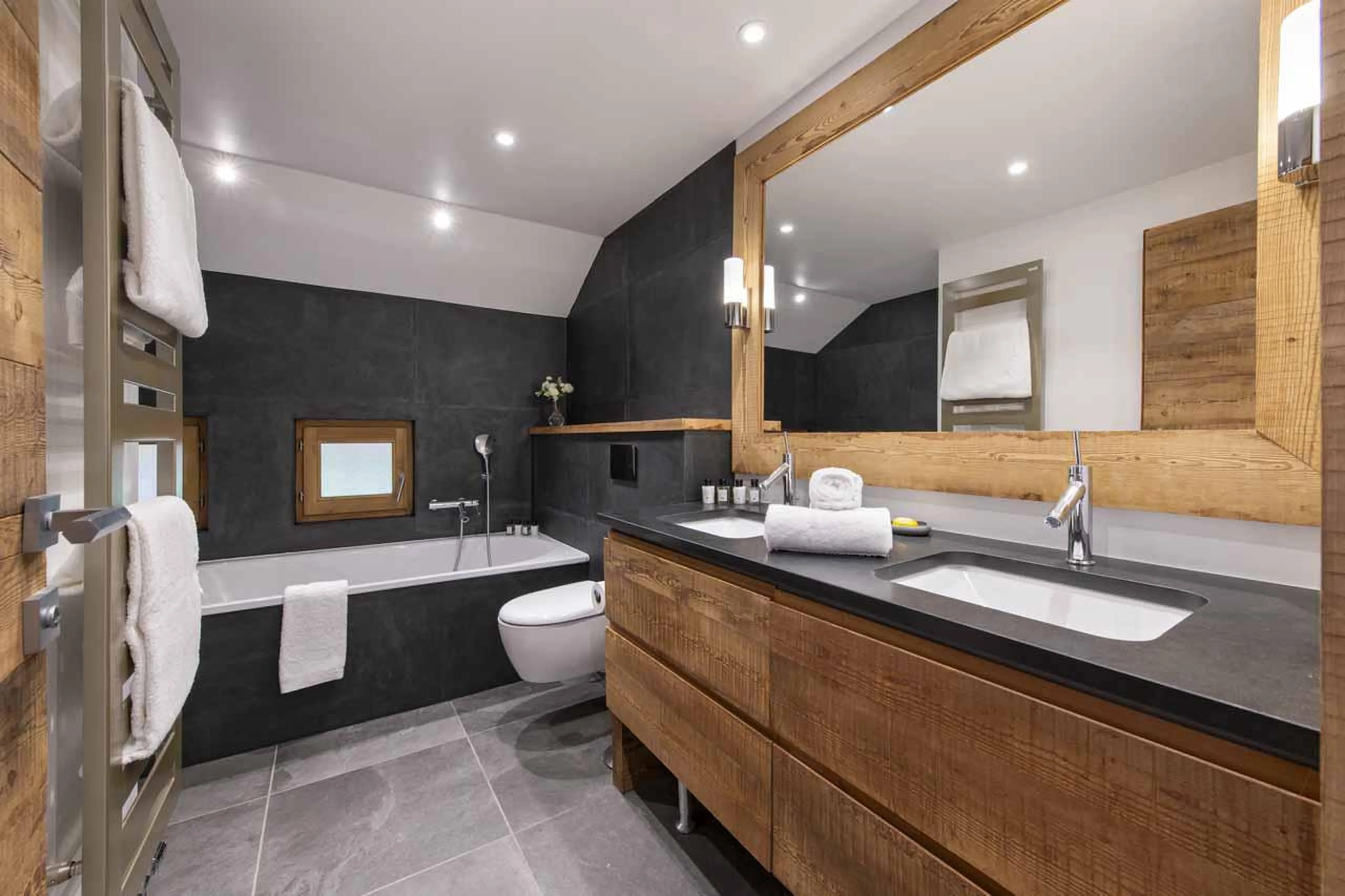 En-suite bathroom with double basin in Chalet La Folie, Meribel