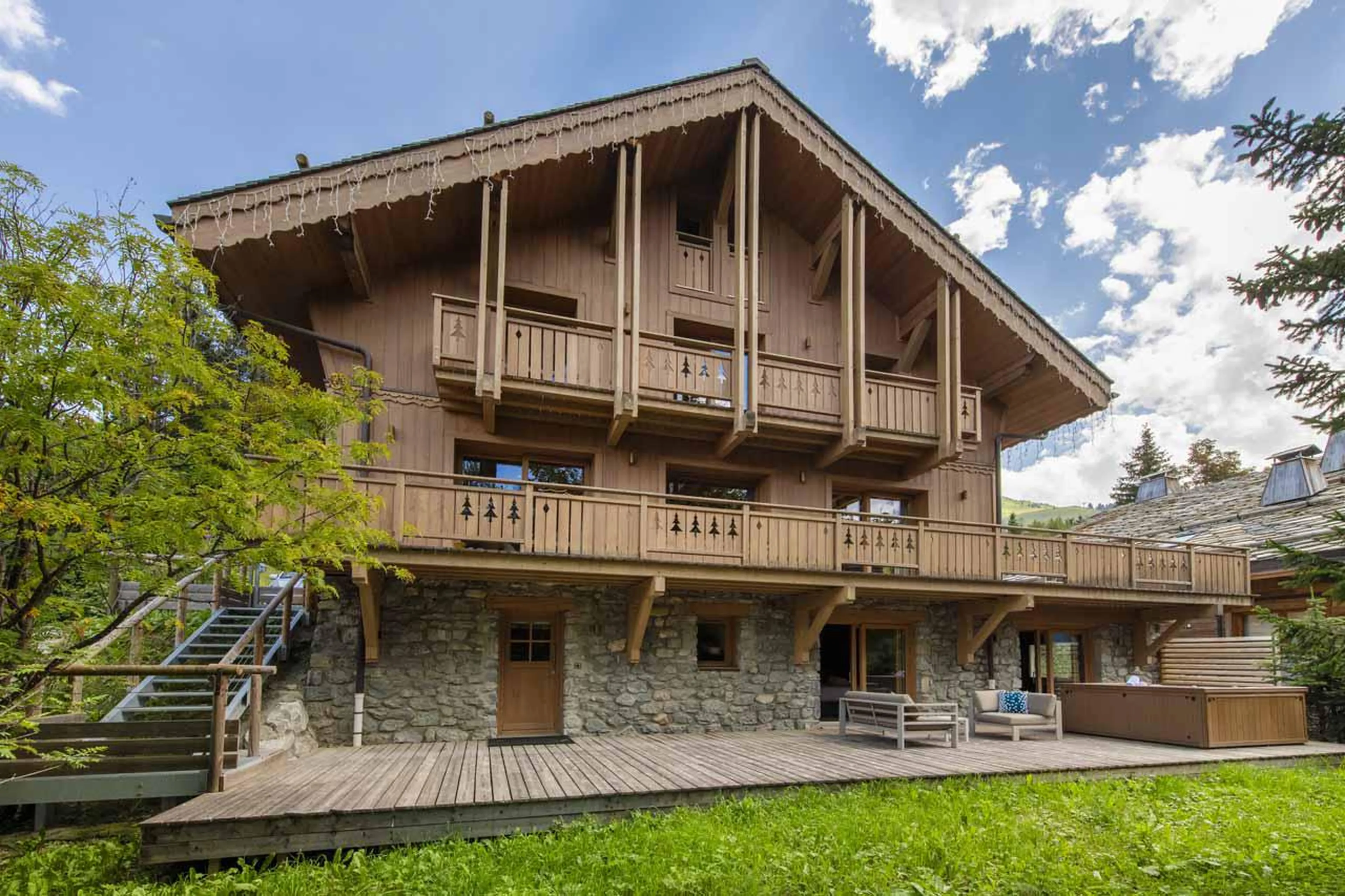 Exterior of Chalet La Folie, Meribel with wrap-around balcony