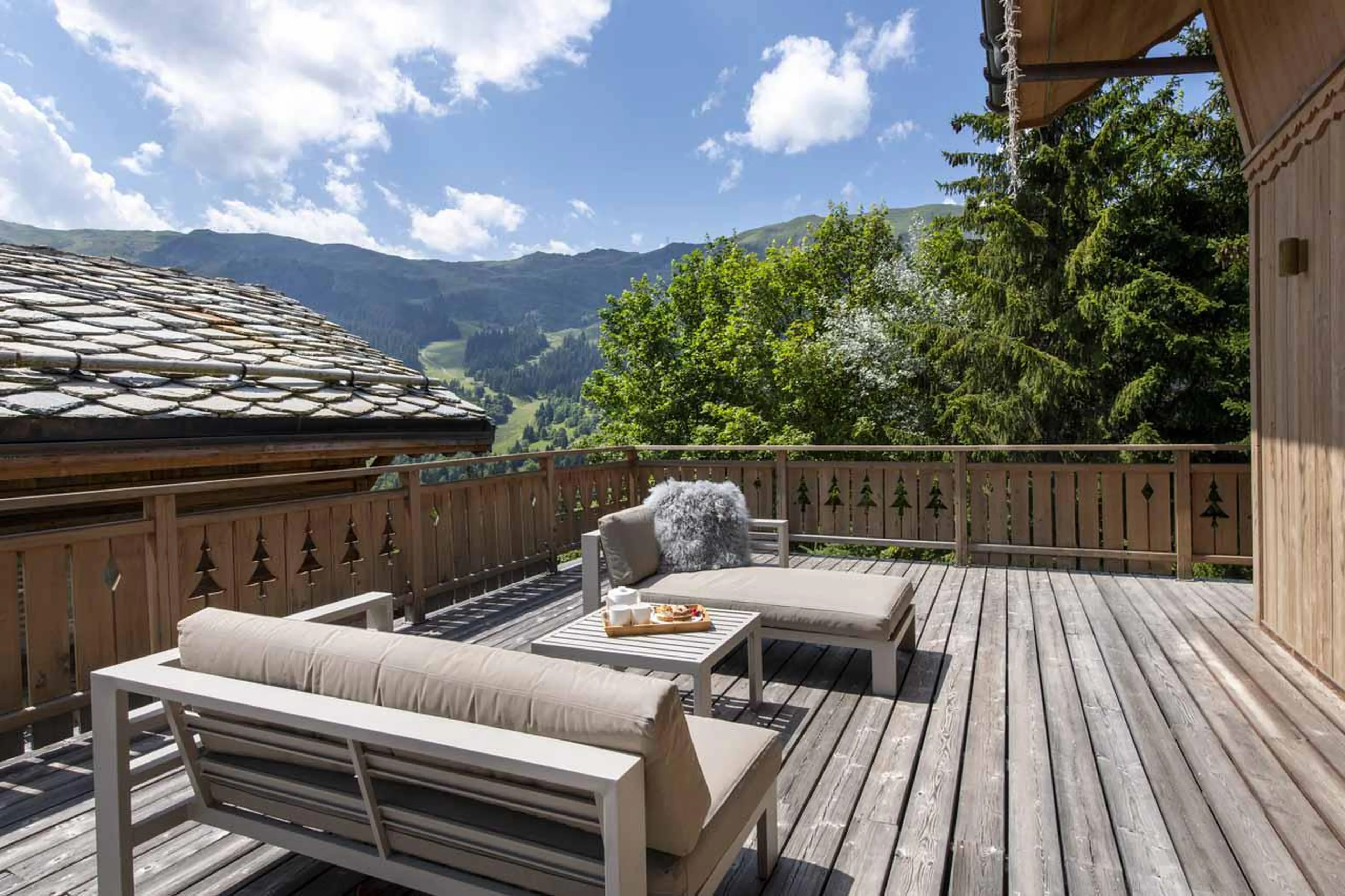 Terrace with outdoor seating in Chalet La Folie, Meribel