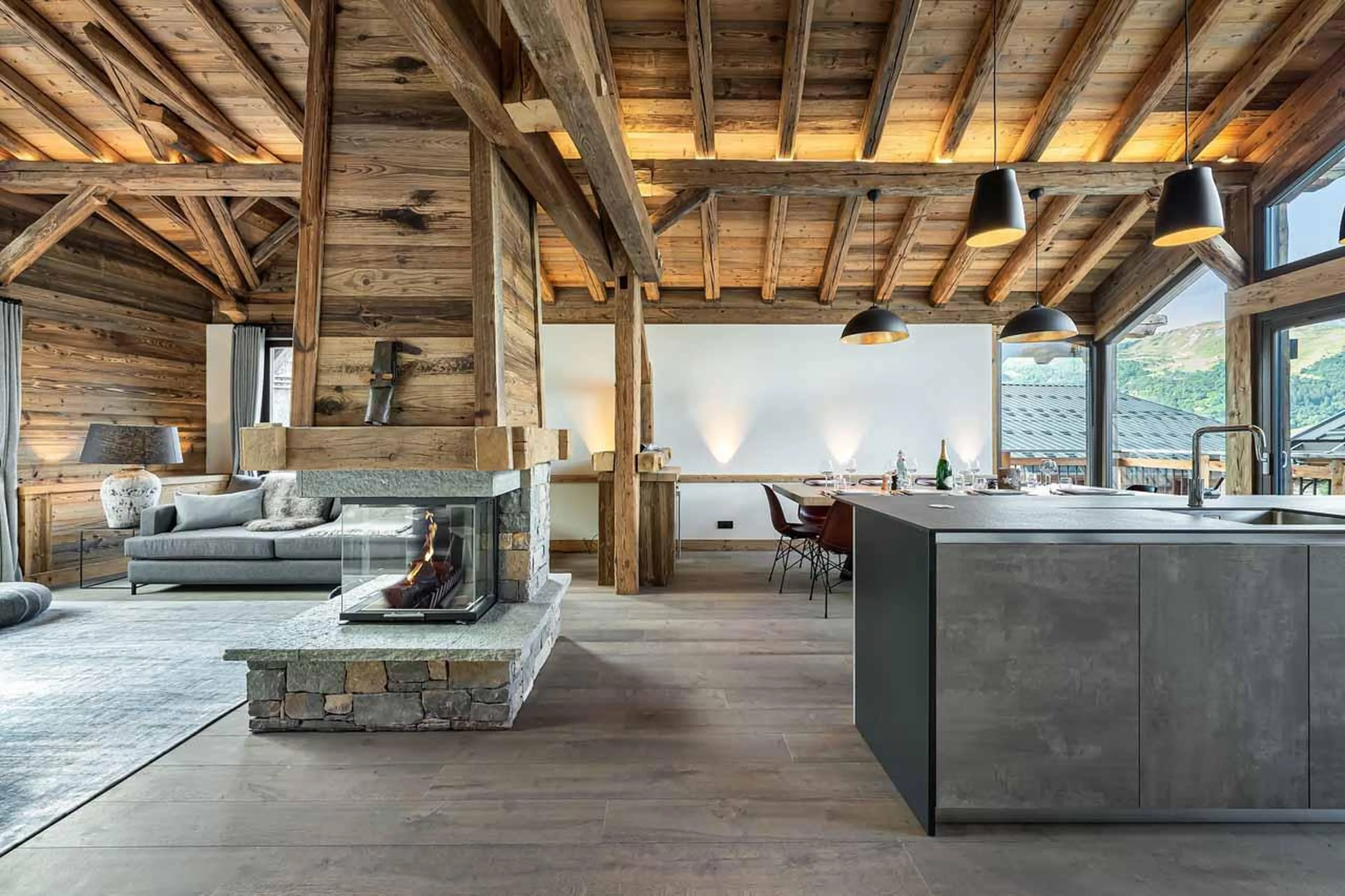 Central fireplace divider at Chalet La Grange in St Martin de Belleville