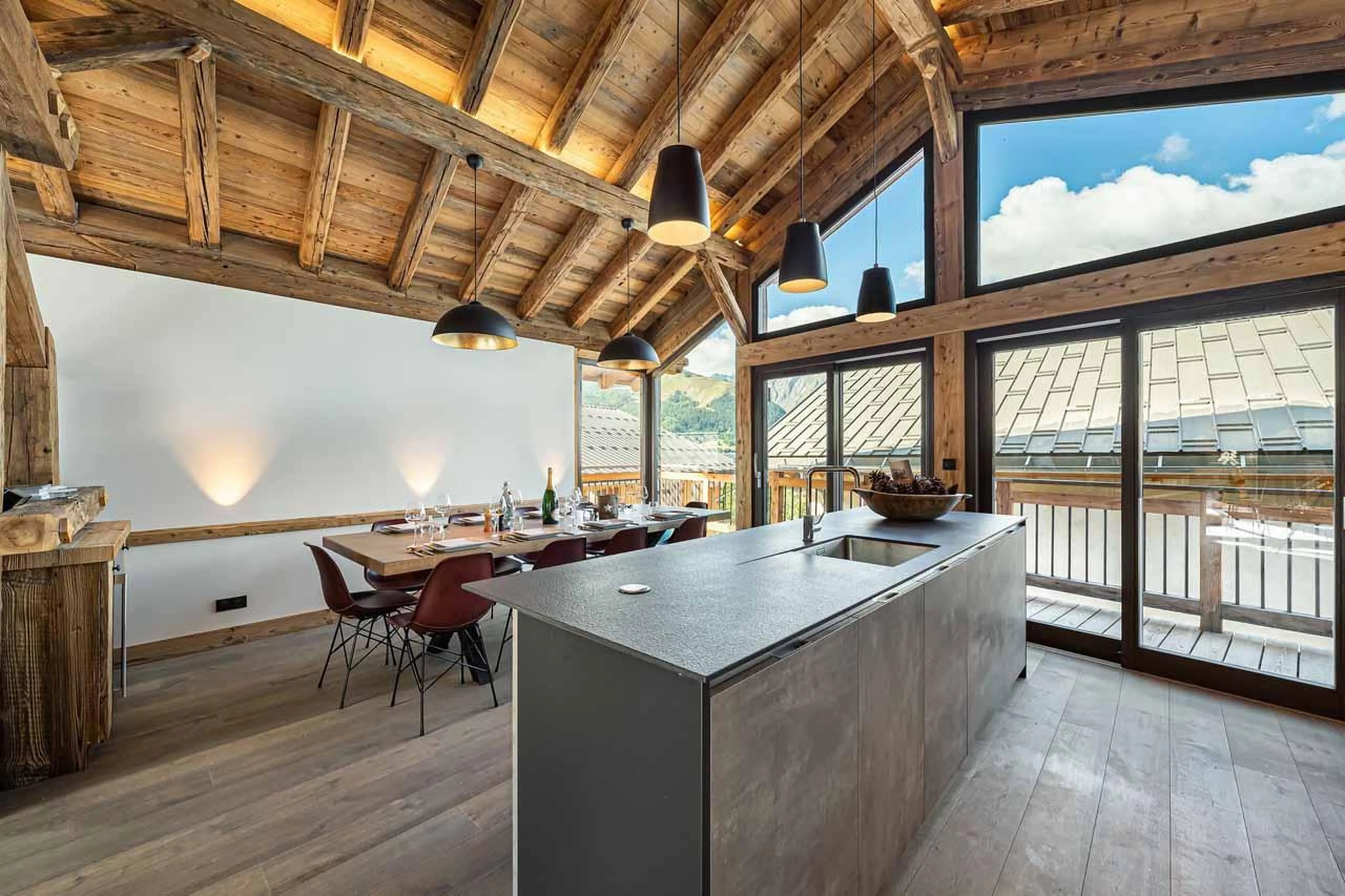 Kitchen and dining area at  Chalet La Grange in St Martin de Belleville