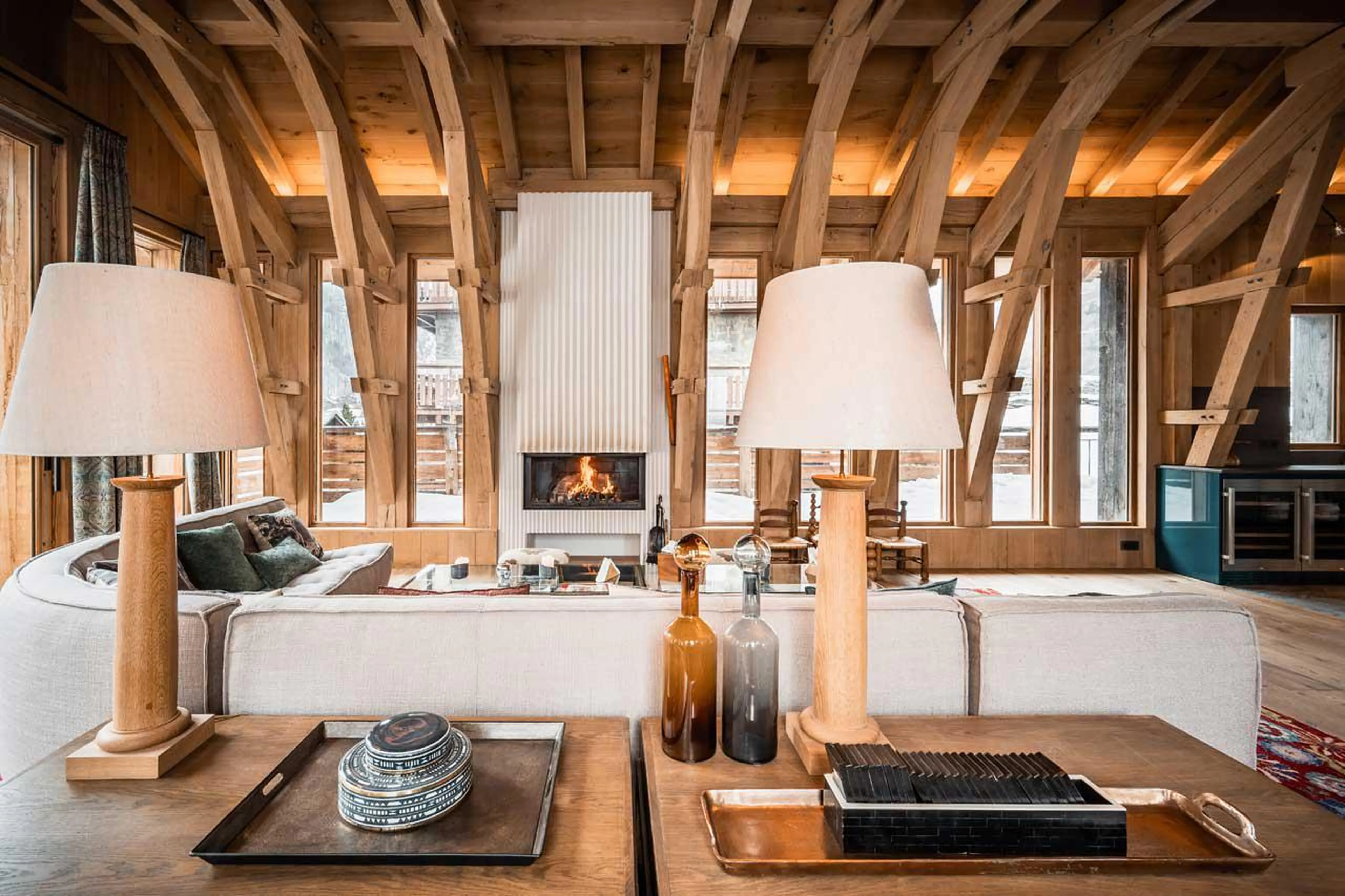 Fireplace and couches in Chalet La Grange in Val d'Isere