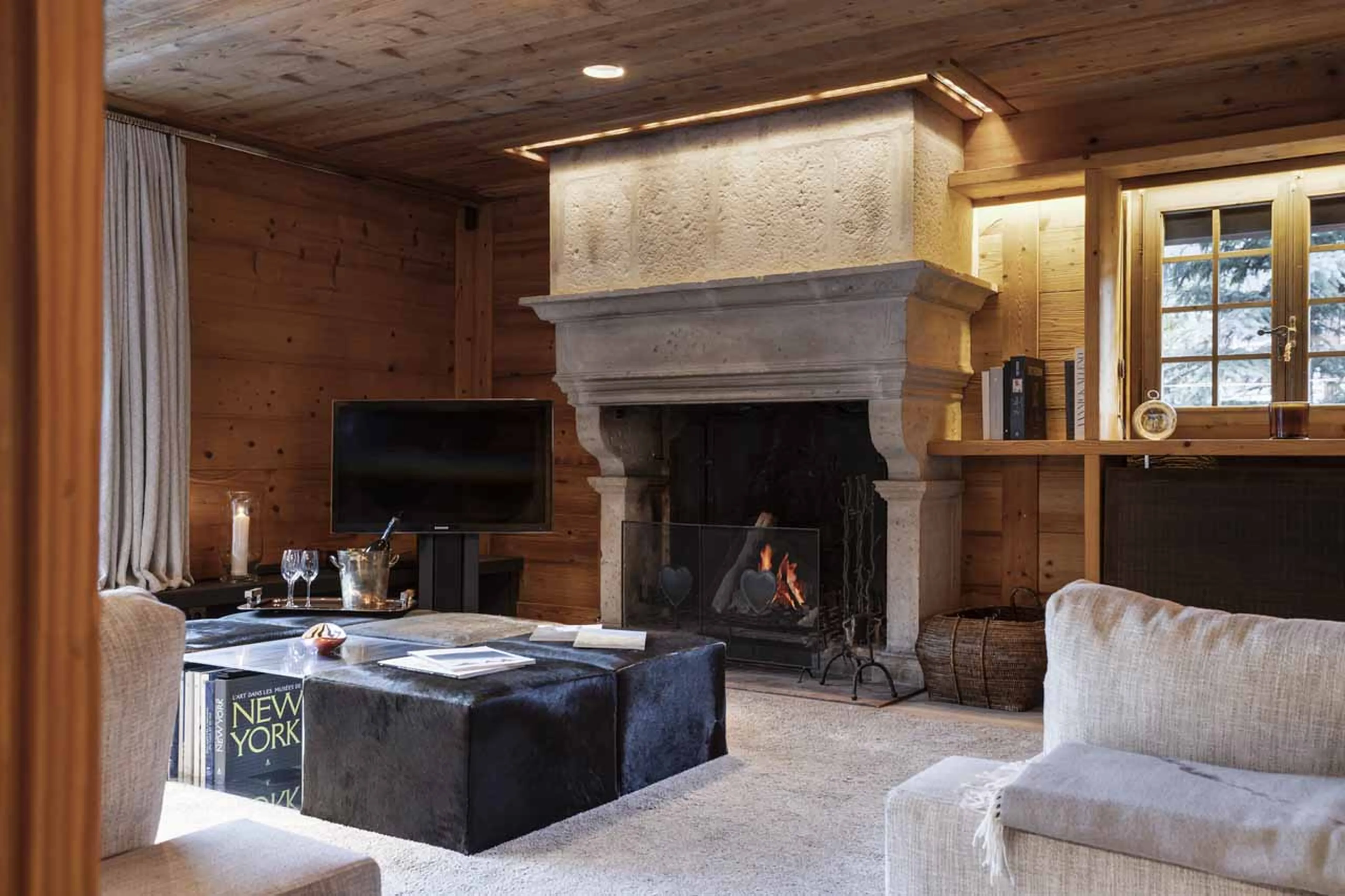 Living area fireplace at Chalet La Reserve in Val d'Isere