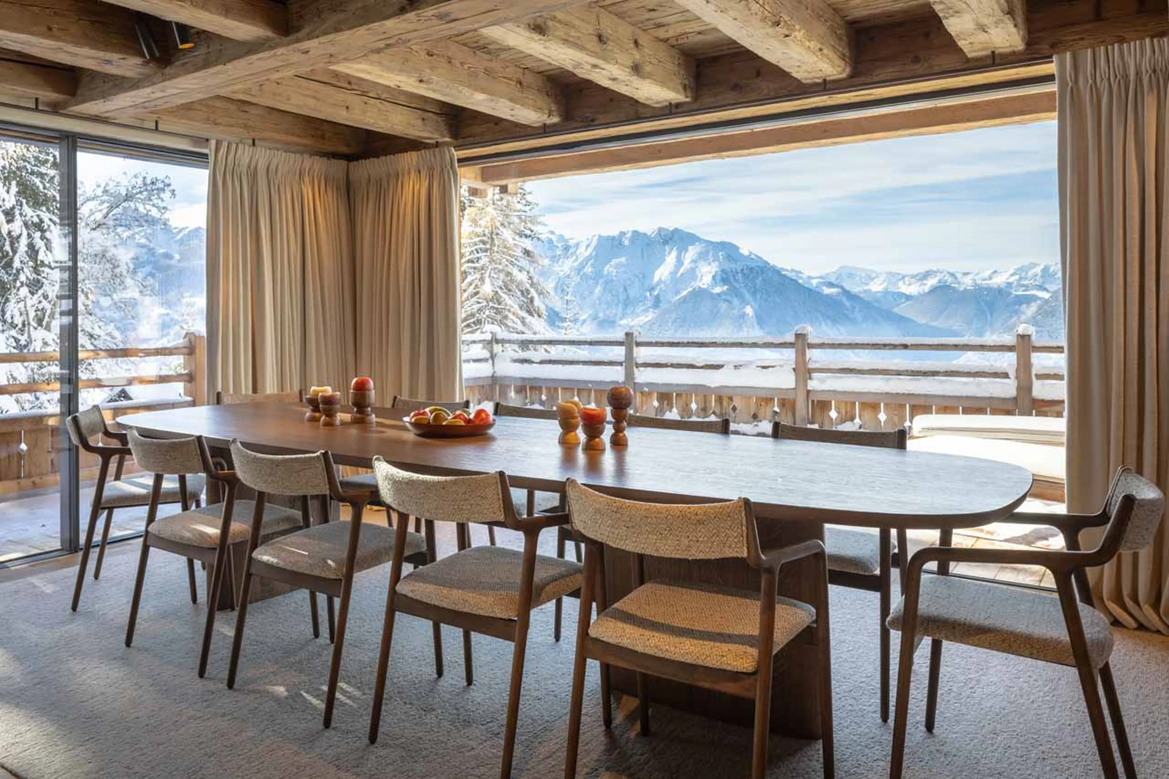 Dining table and windows in Chalet La Rochette, Verbier