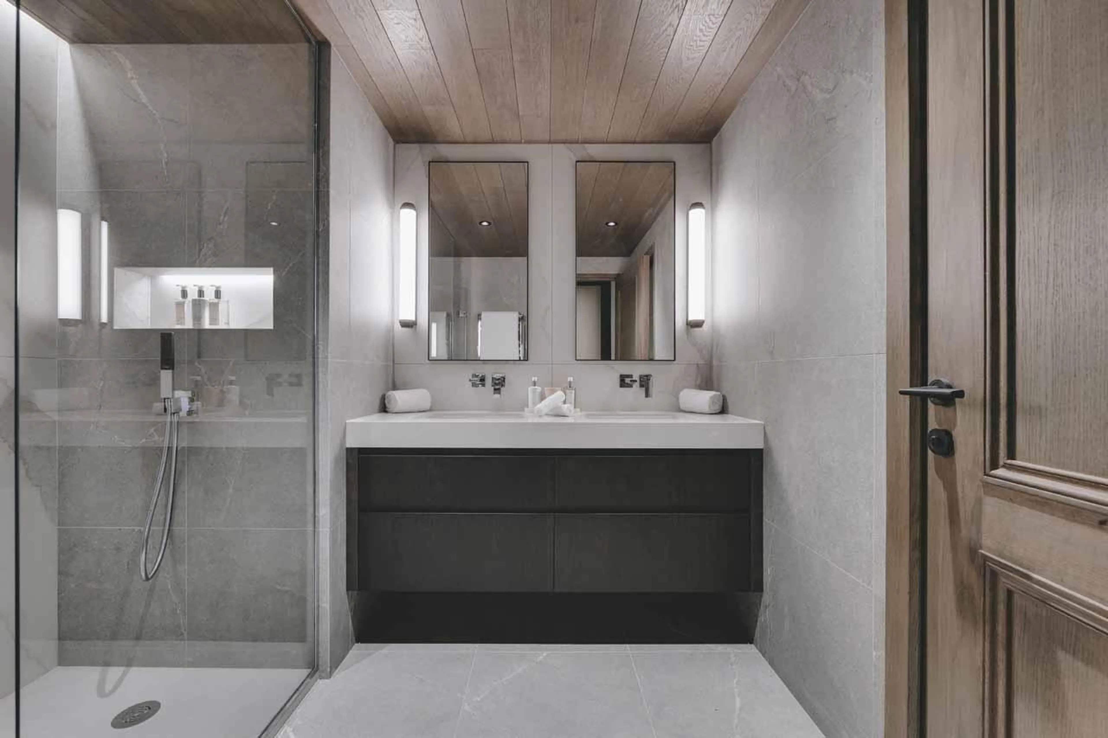 En-suite shower room with double basin at Chalet La Tene, Val d'Isere