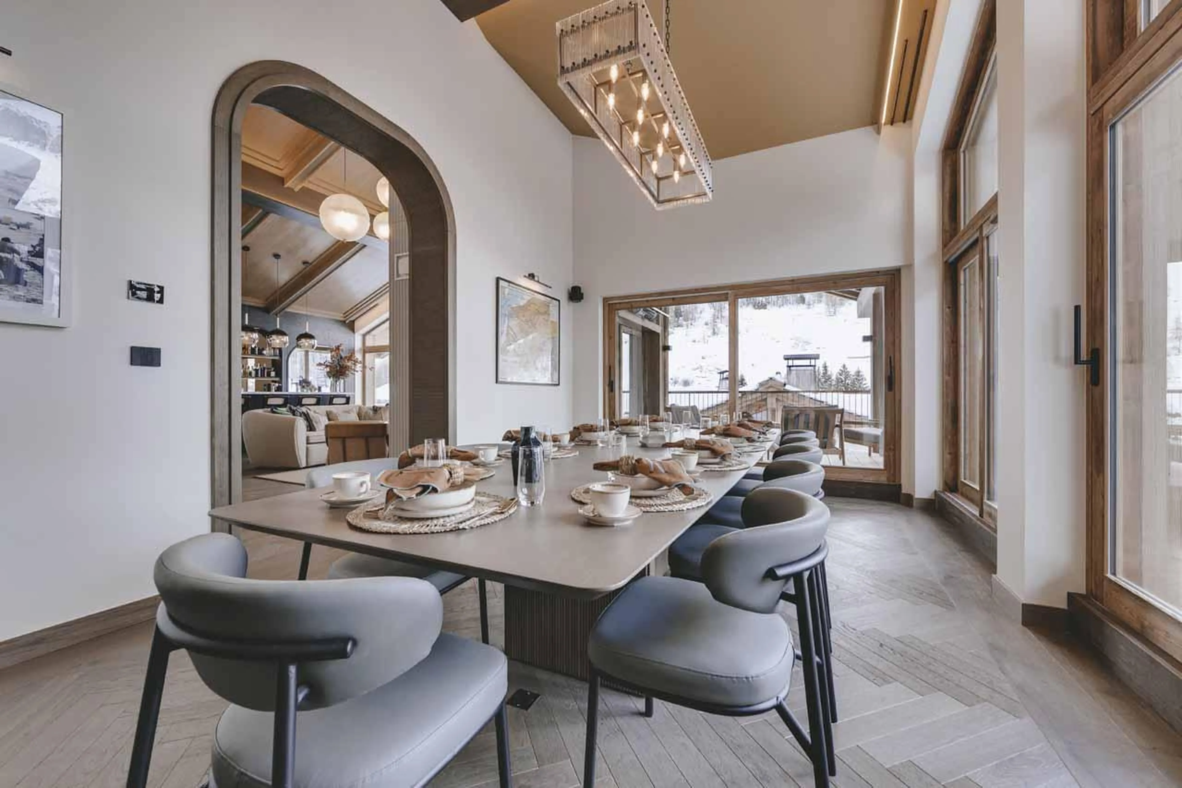 Long wooden dining table at Chalet La Tene, Val d'Isere