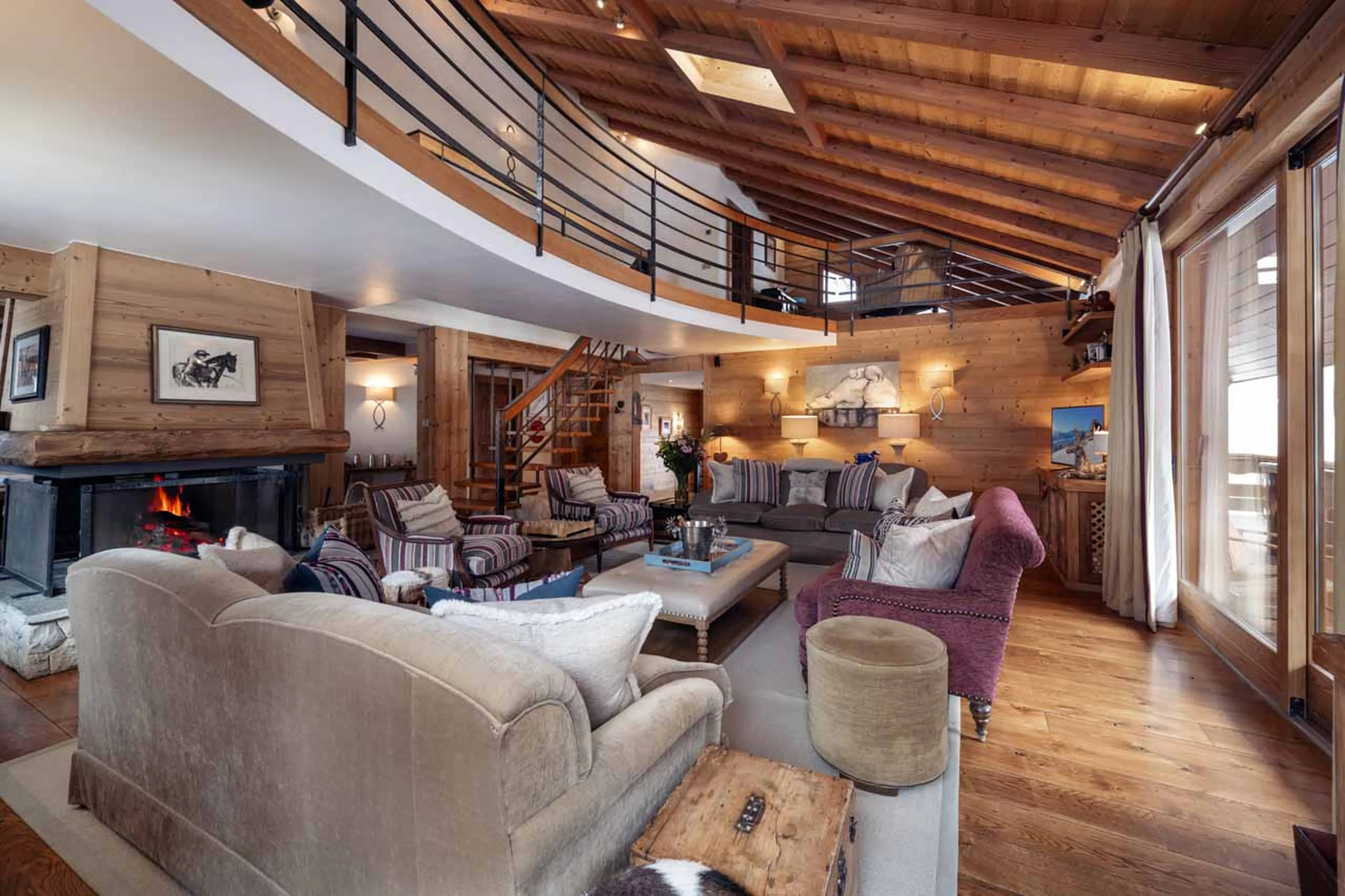 Beautiful mountain views from living area at Chalet Lapin Blanc in Meribel