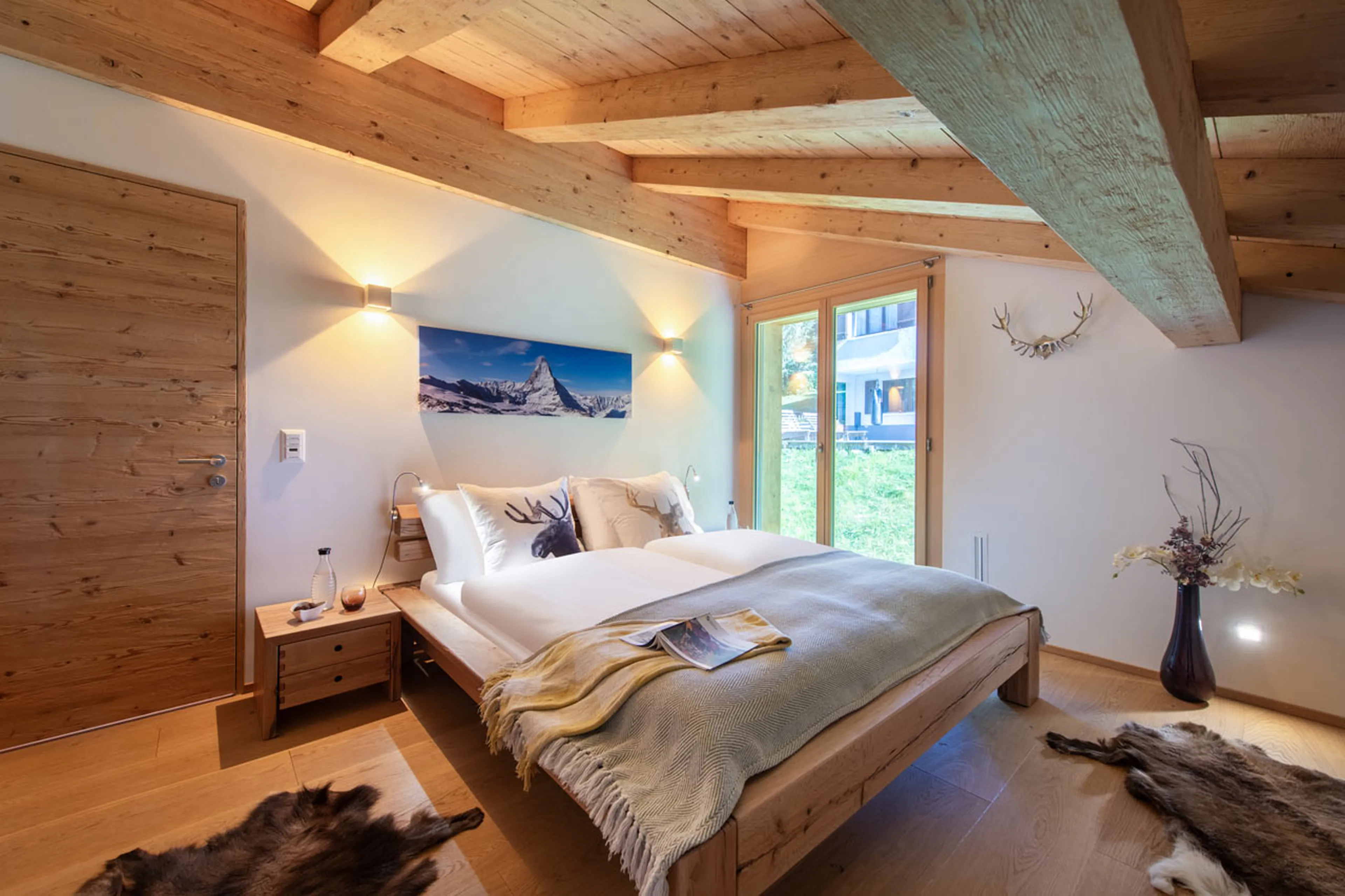 Double bedroom two at Chalet Larch in Davos