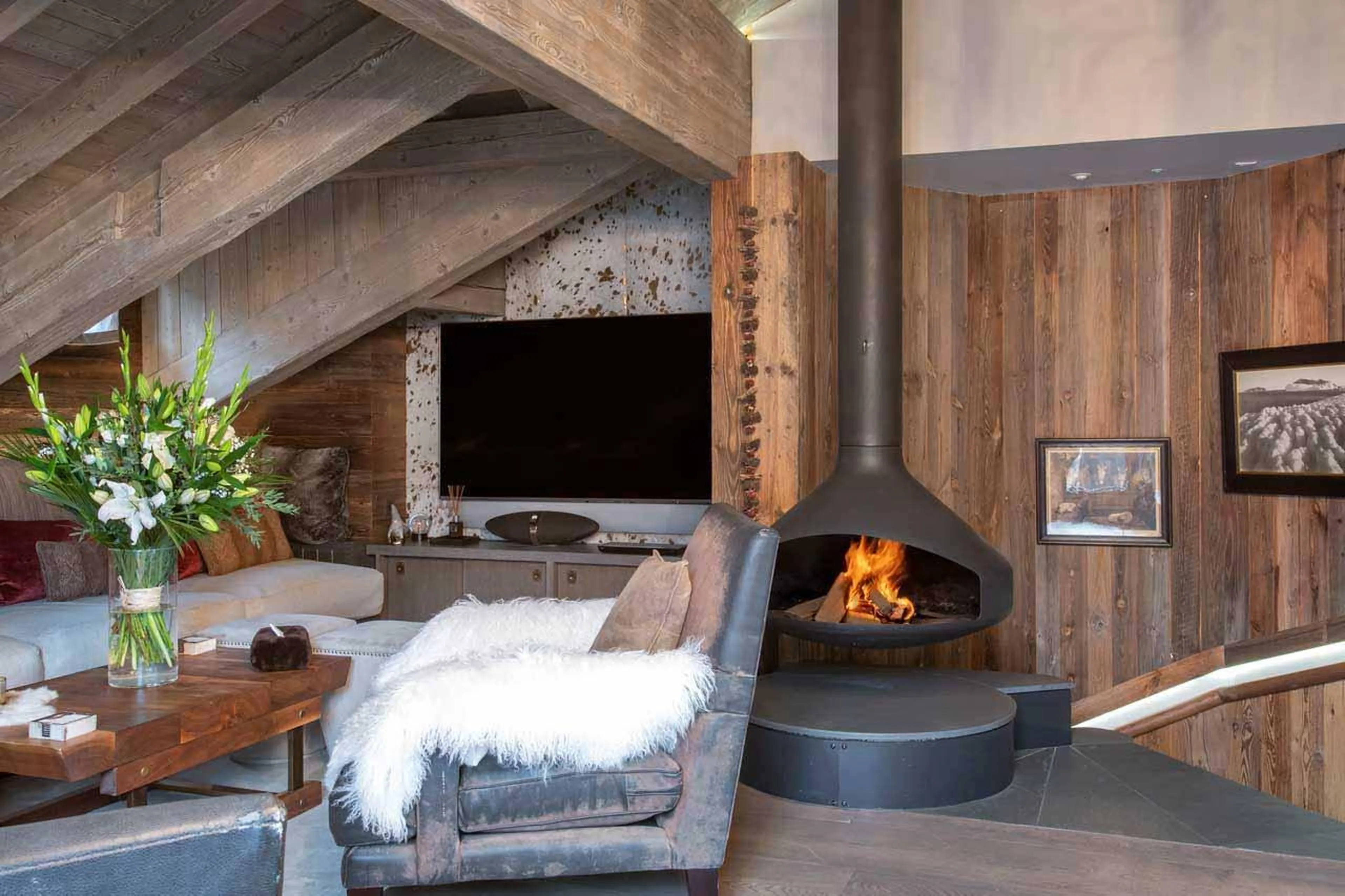 Suspended fireplace in Chalet L’Arctique in Courchevel 1850