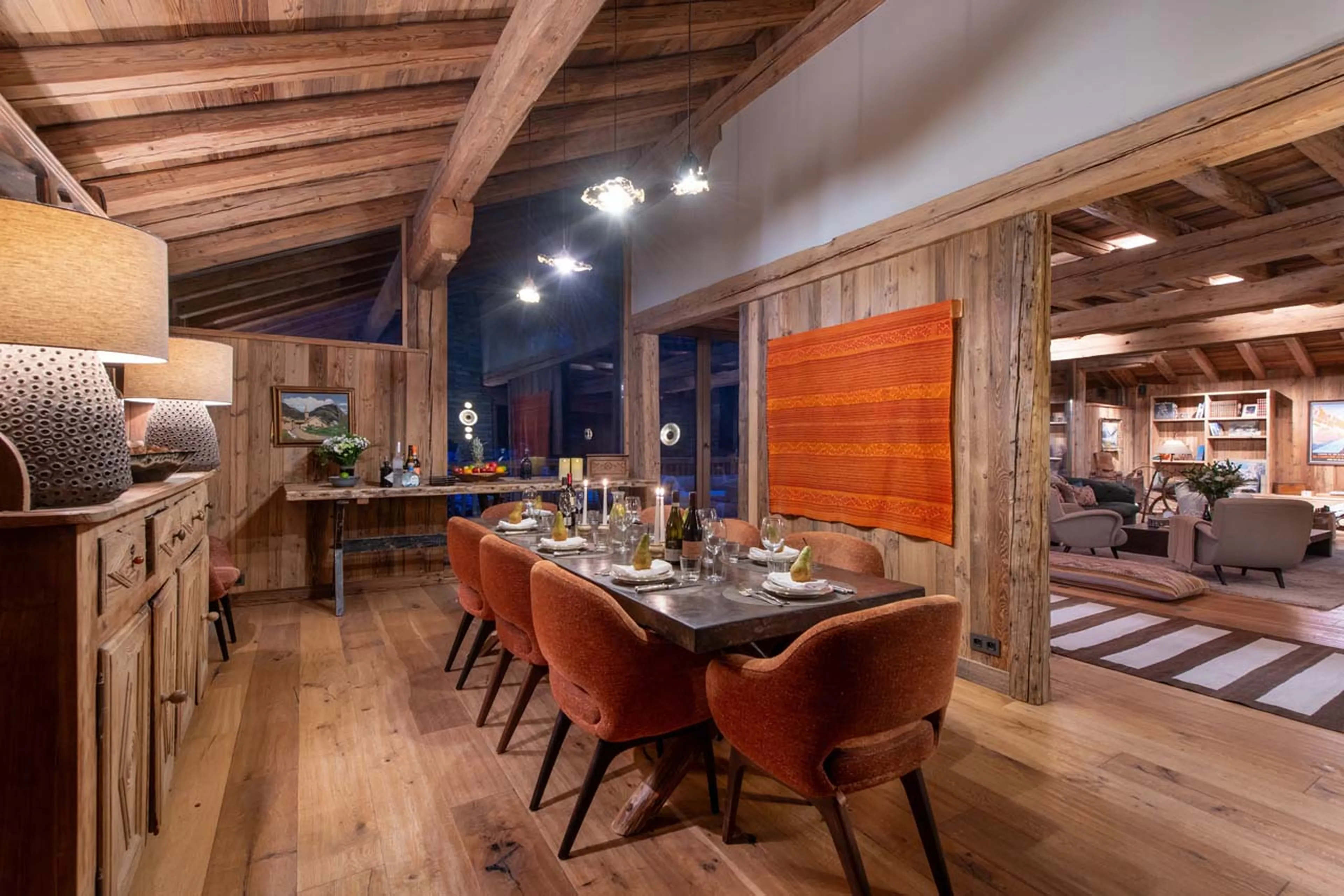 Dining area and living room at Chalet Lashca in Val d'Isere