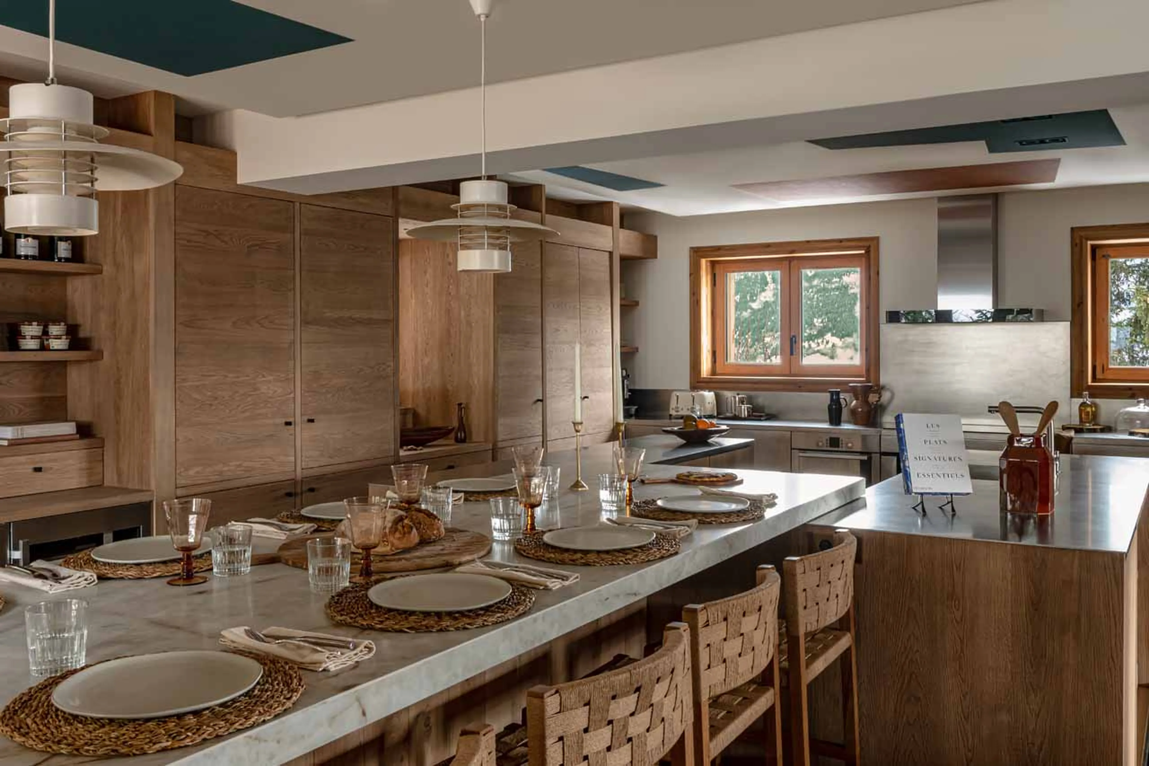 Breakfast table and kitchen at Chalet Le 1550 in Courchevel 1550