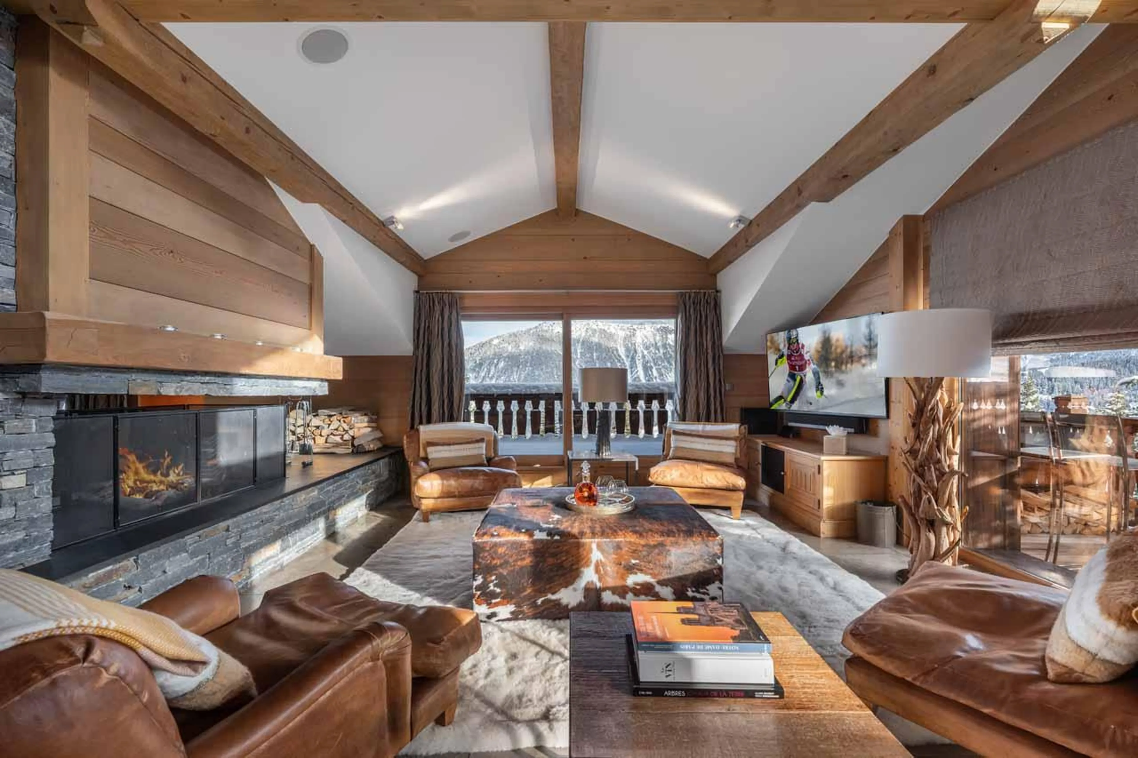Fireplace in living area at Chalet Le Blanchot in Courchevel 1850