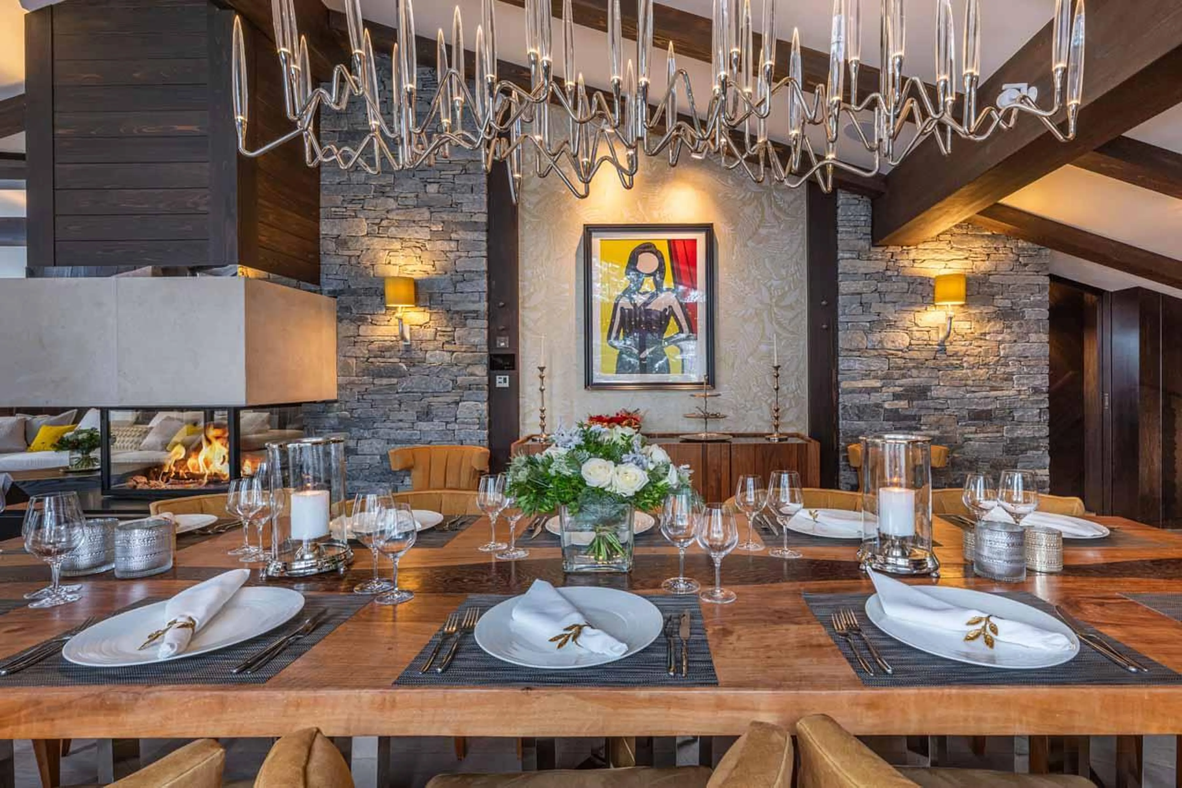 Chandelier above dining table of Chalet Le Coquelicot in Courchevel 1850