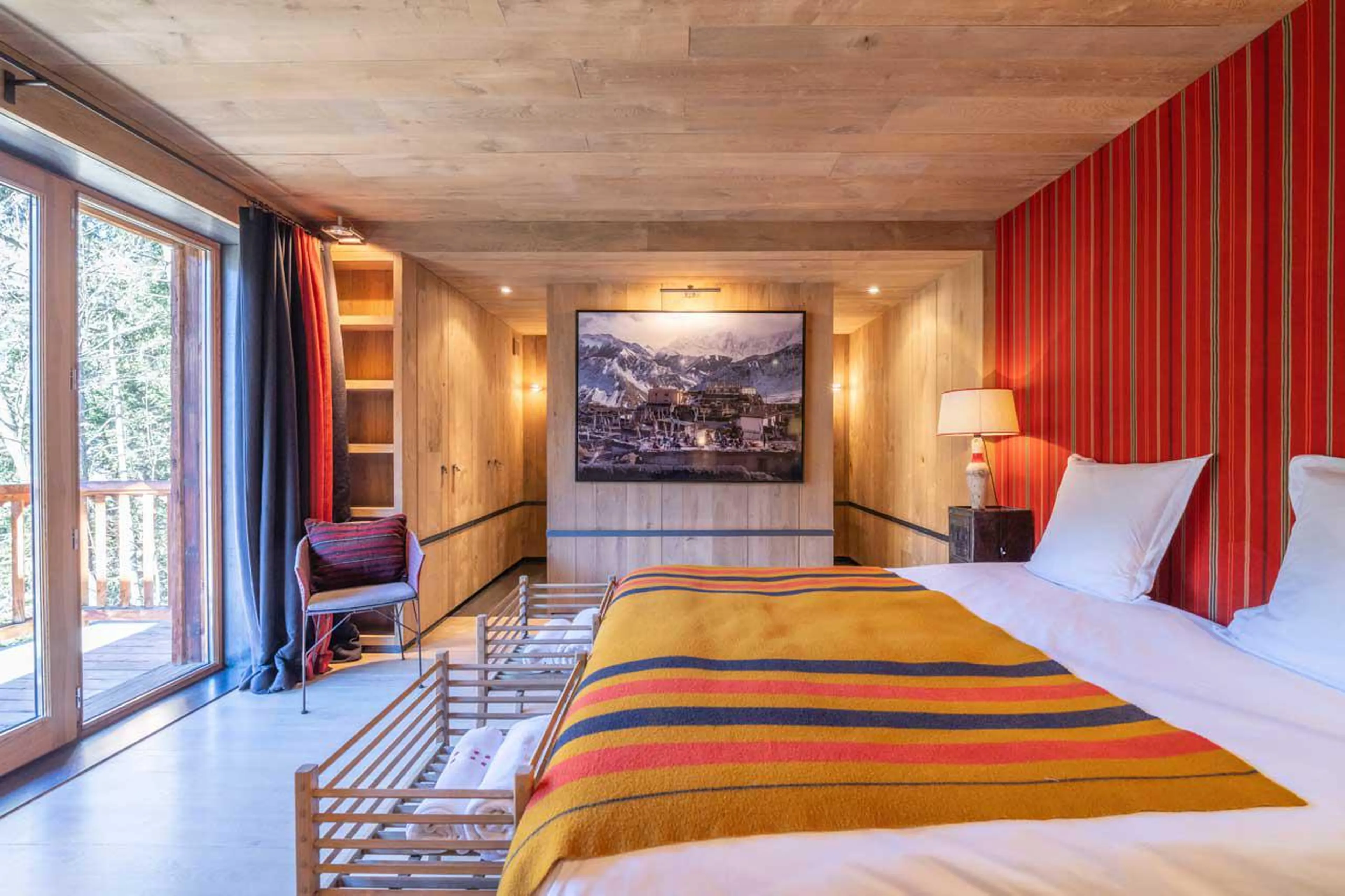 Double bedroom with access to beautiful balcony at Le Grand Cerf in Meribel