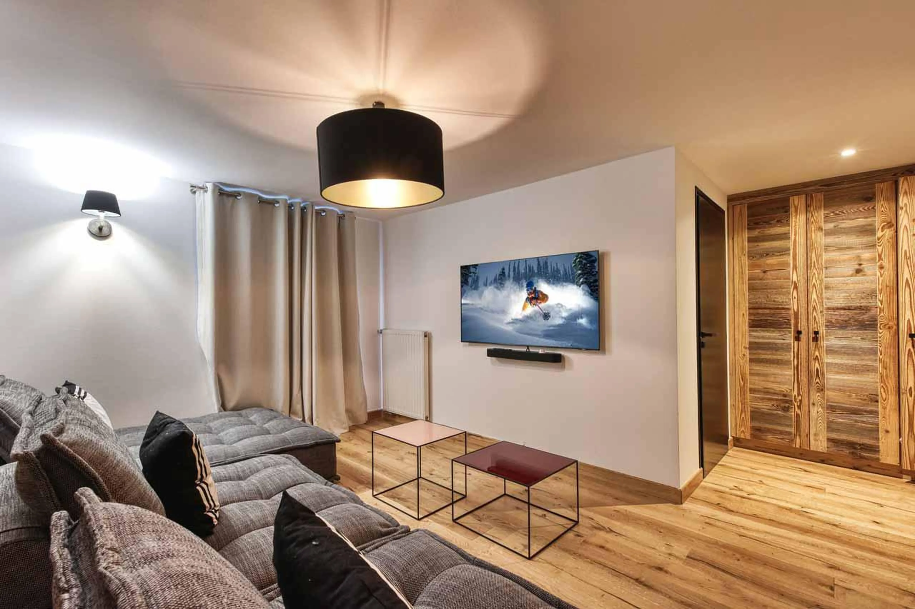 TV room with sofas at Chalet Le Marti in Chamonix