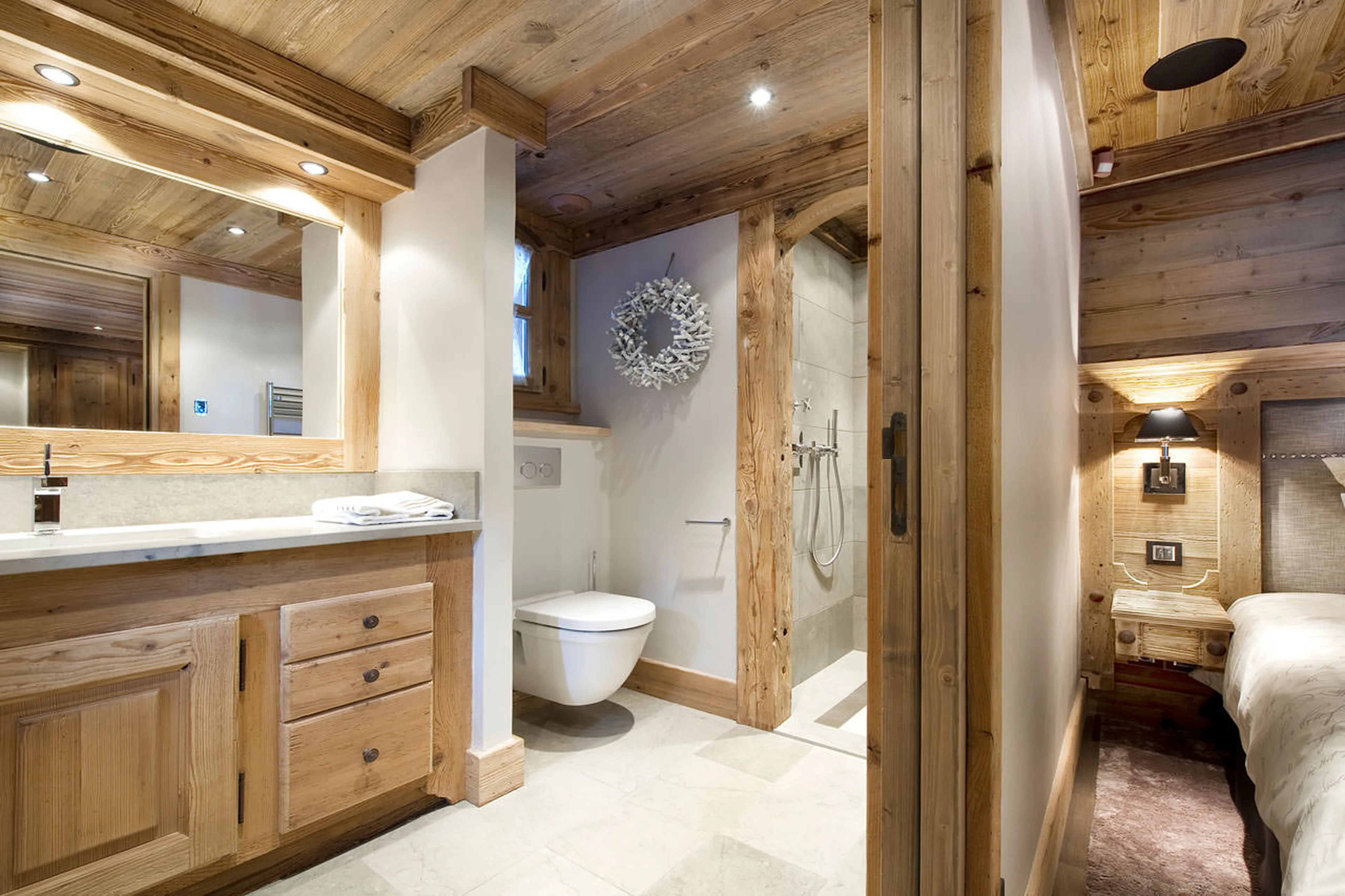Shower room en suite to king size bedroom in Chalet Le Petit Chateau in Courchevel 1850