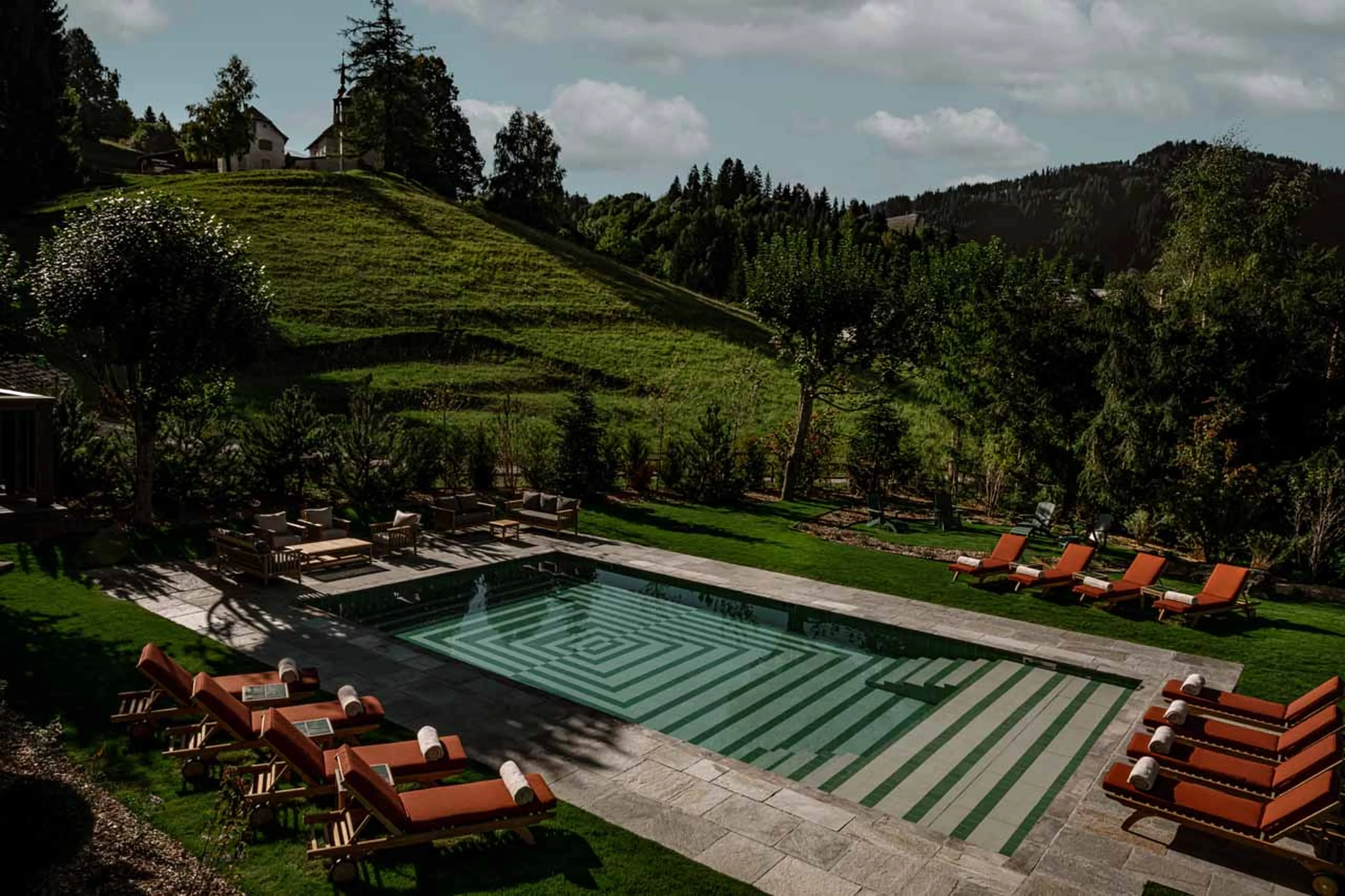 Outdoor swimming pool at Chalet Le Sarto in Megeve