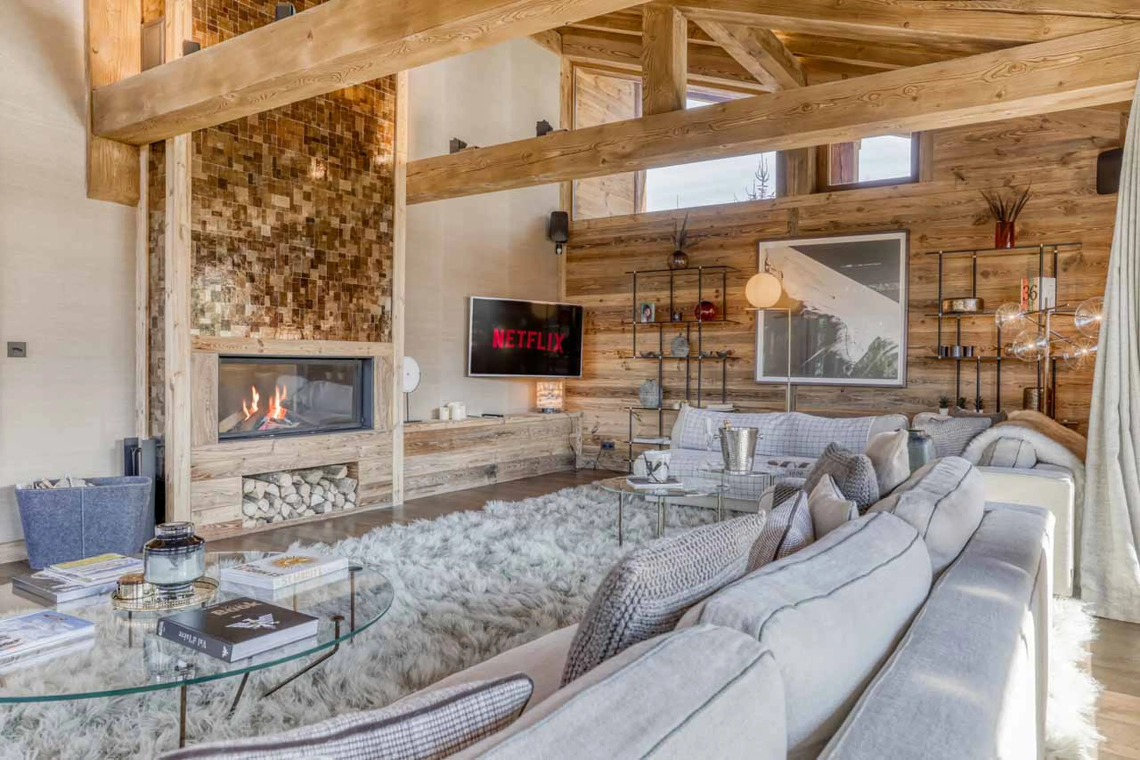 Living area fireplace at Chalet l'Echappee d'Arbois in Megeve