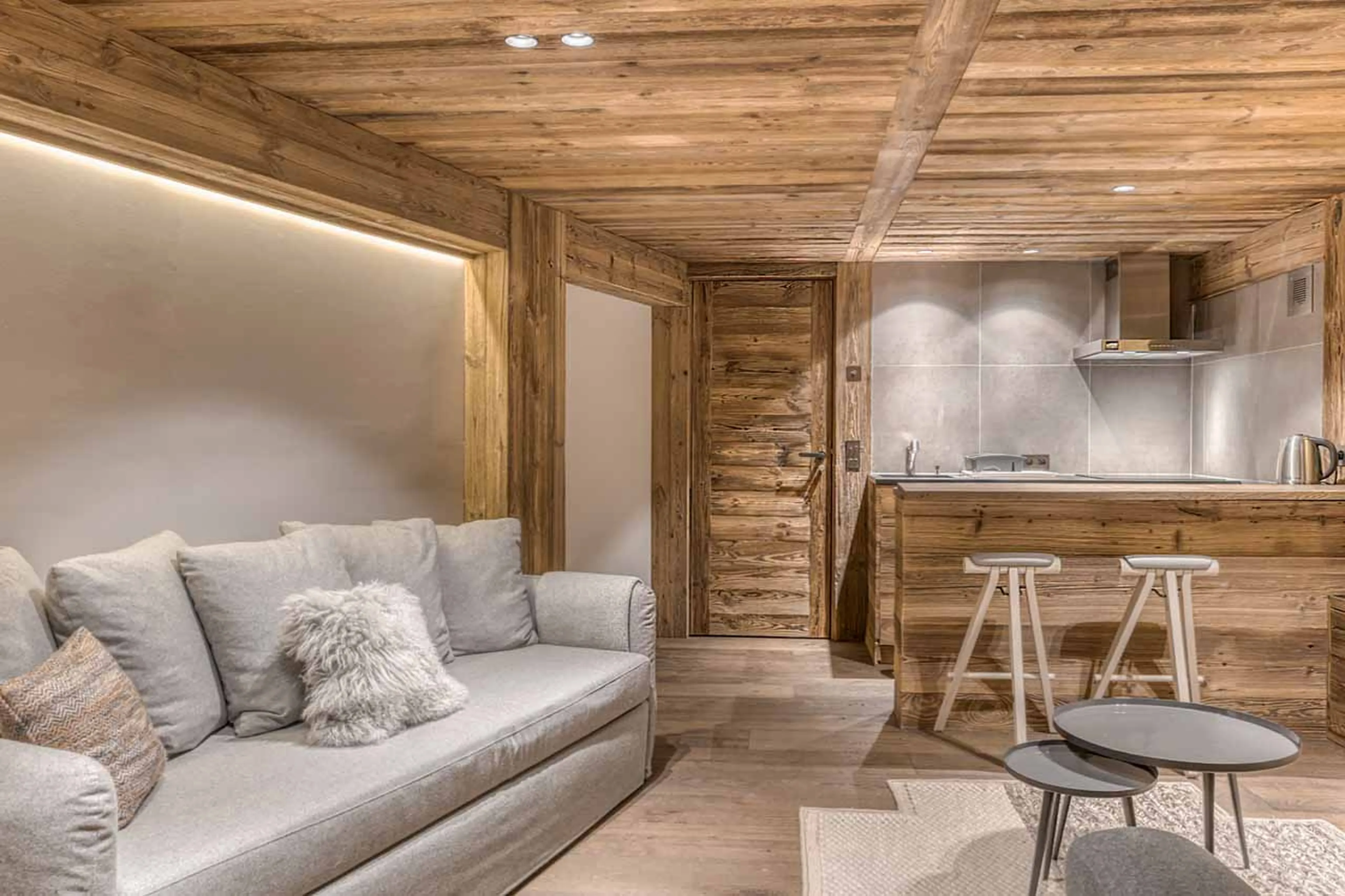 Staff apartment sofa bed at Chalet l'Echappee d'Arbois in Megeve