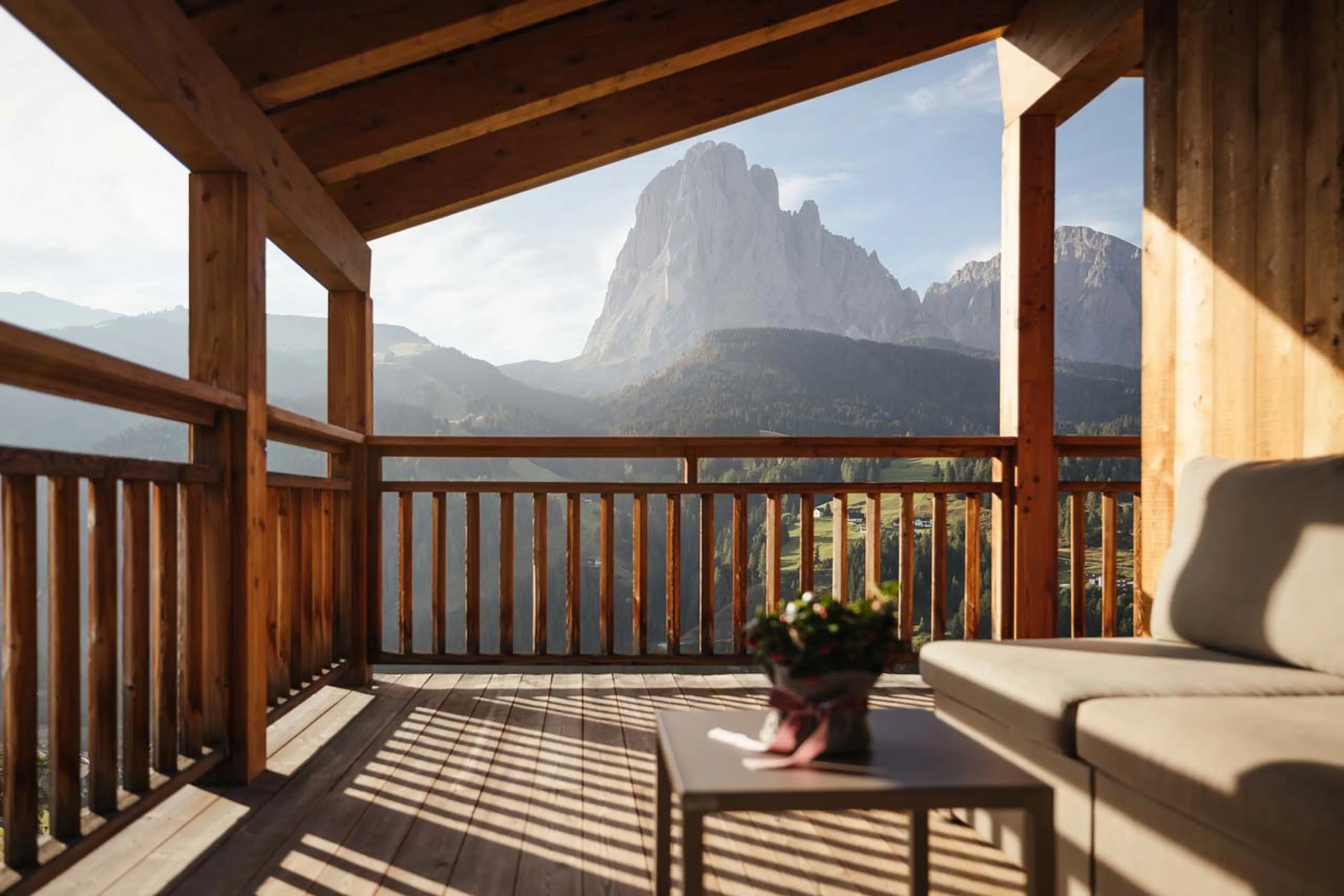 Comfortable outdoor seating with mountain views in Chalet Lefiro, Val Gardena