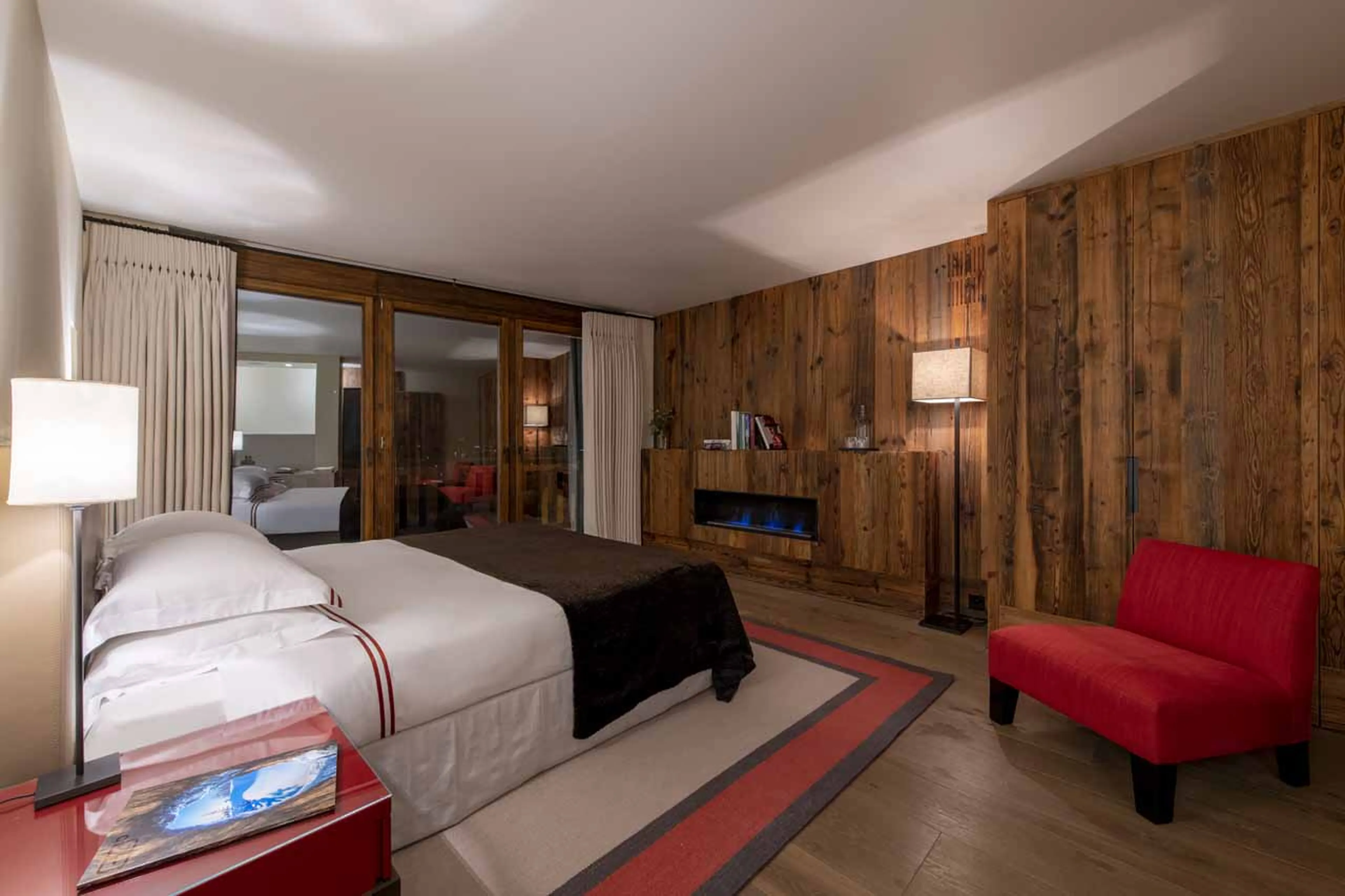 Bio-fuel fireplace in bedroom two at Chalet Les Anges in Zermatt