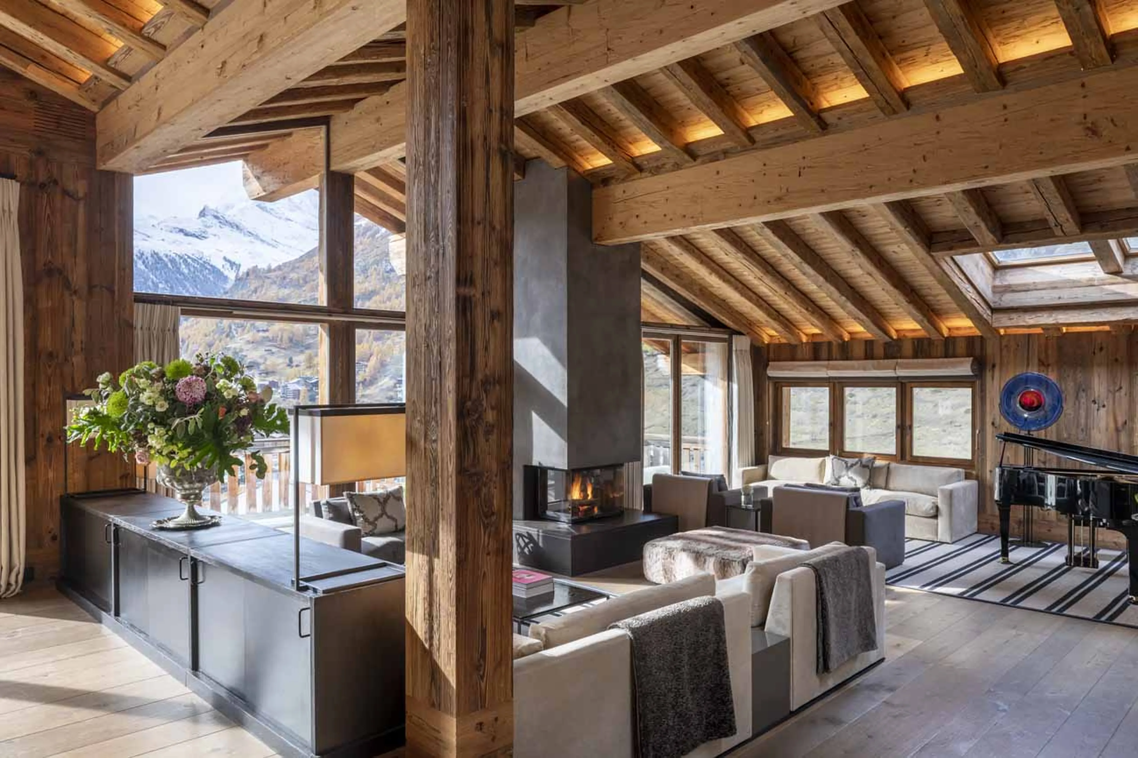 Grand piano in living room of Chalet Les Anges in Zermatt