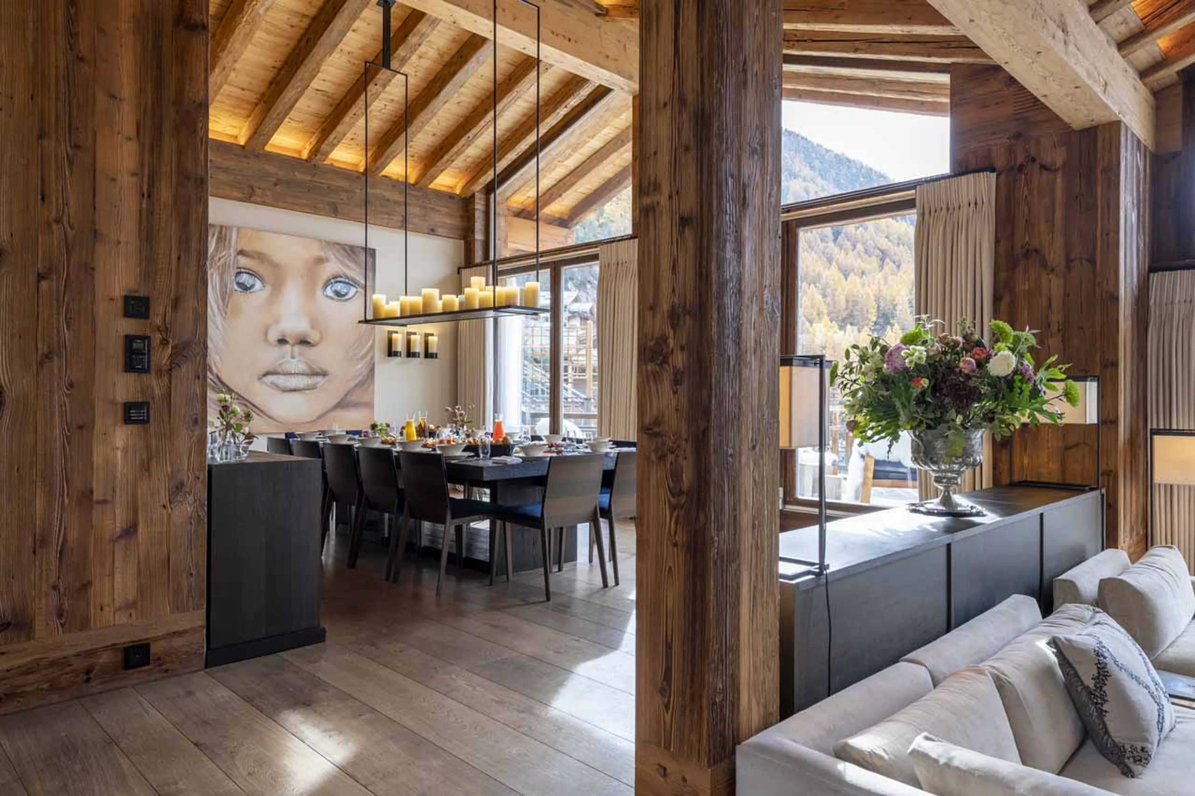 Dining area opening onto terrace at Chalet Les Anges in Zermatt