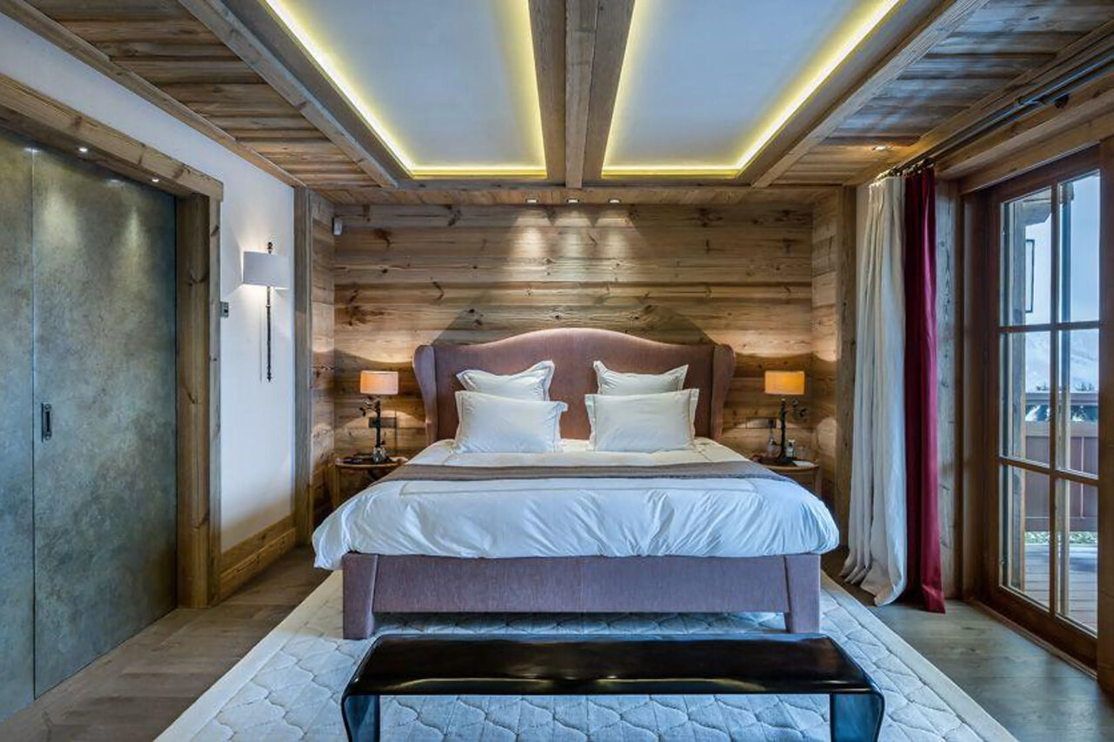 Master bedroom suite with balcony access in Chalet Les Bastidons  in Courchevel 1850