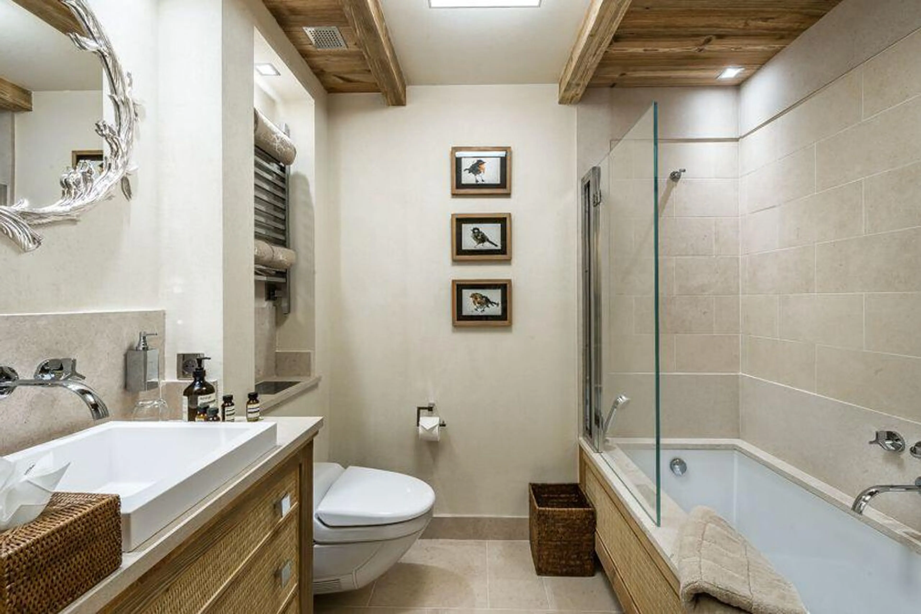 En suite bathroom connected to double bedroom in Chalet Les Bastidons  in Courchevel 1850