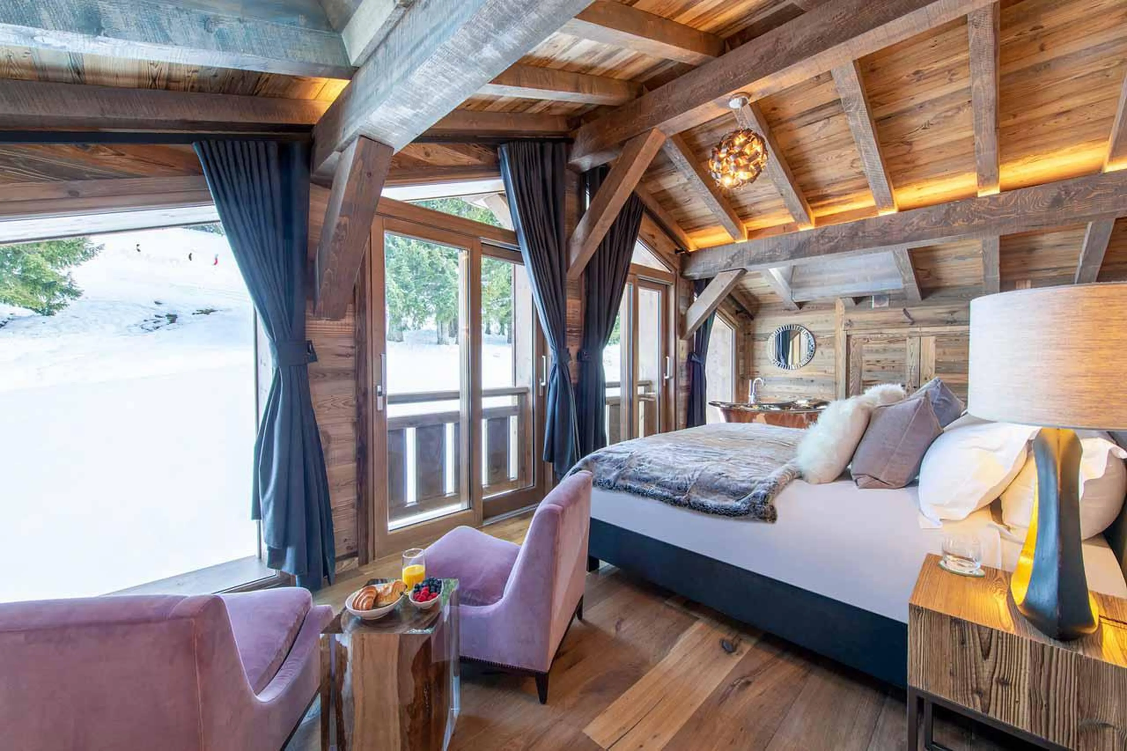 Floor-to-ceiling windows at Chalet les Sapins in Les Gets