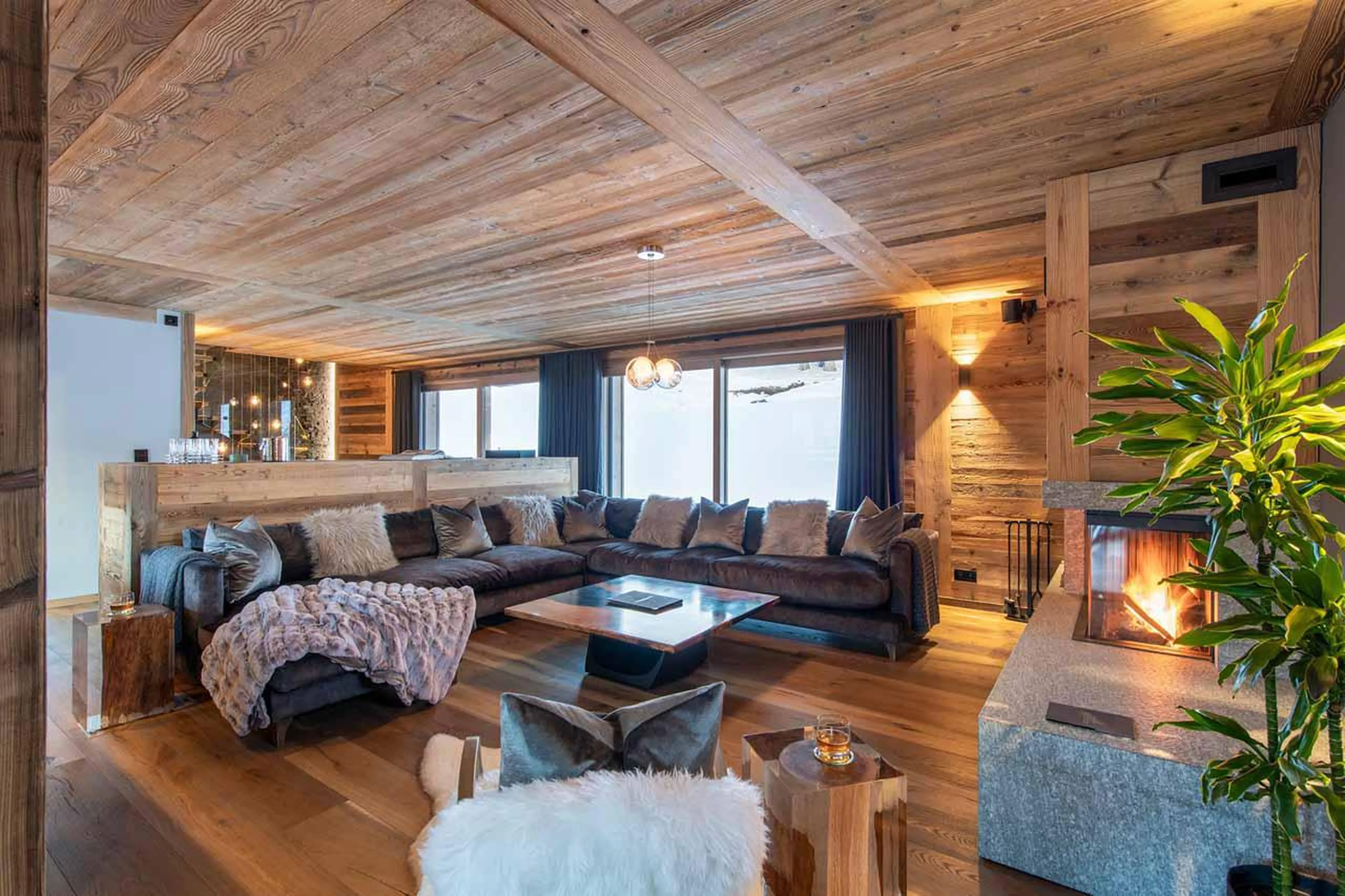 Doors open onto terrace at Chalet les Sapins in Les Gets