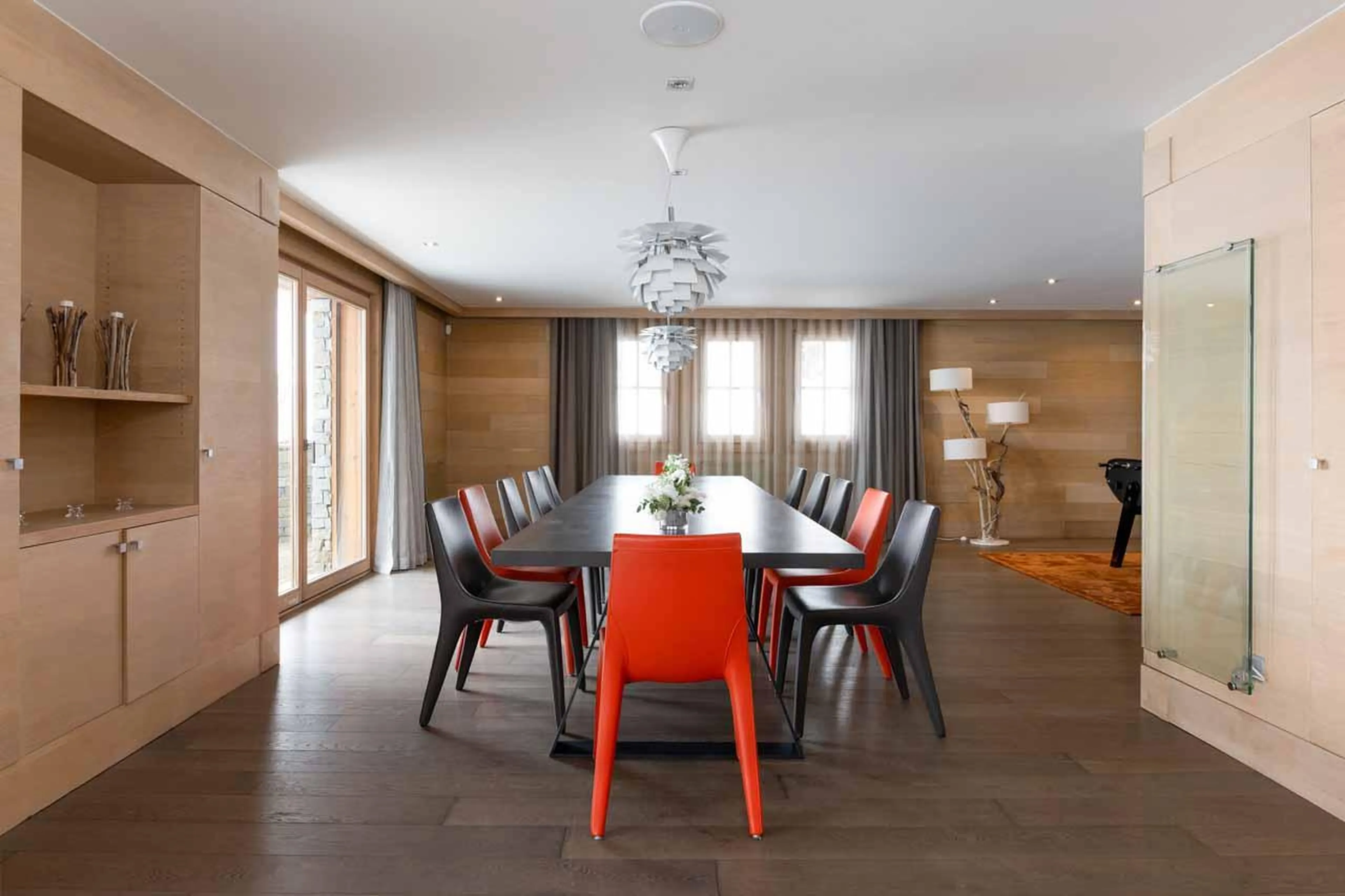 The dining table in the open-plan area of Chalet Licorne in Courchevel 1650