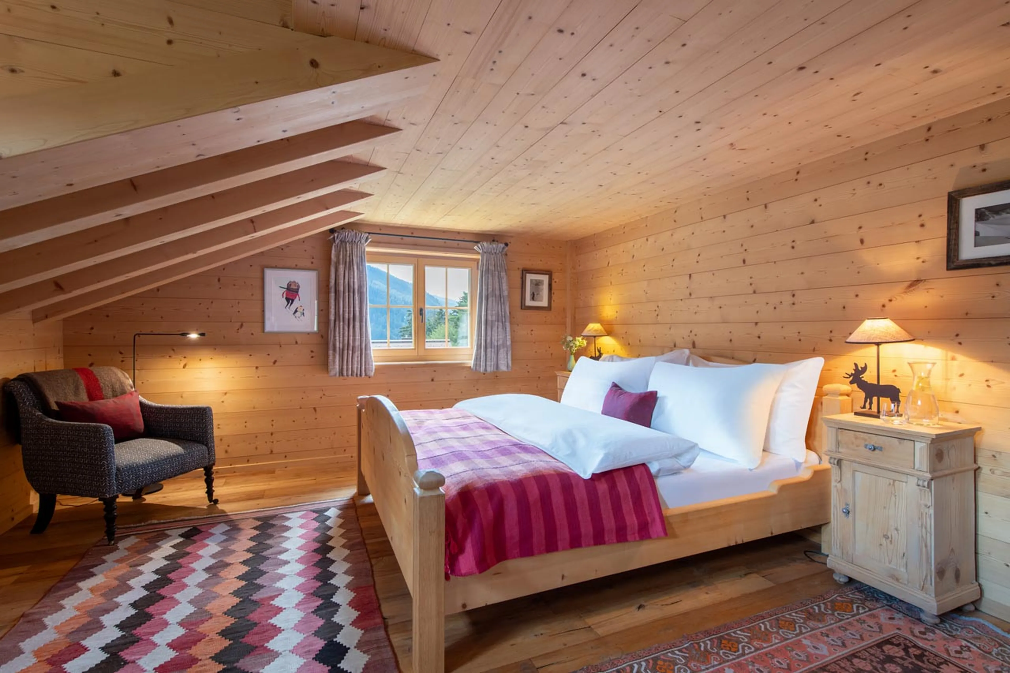Master bedroom at Chalet Leugisland in Klosters