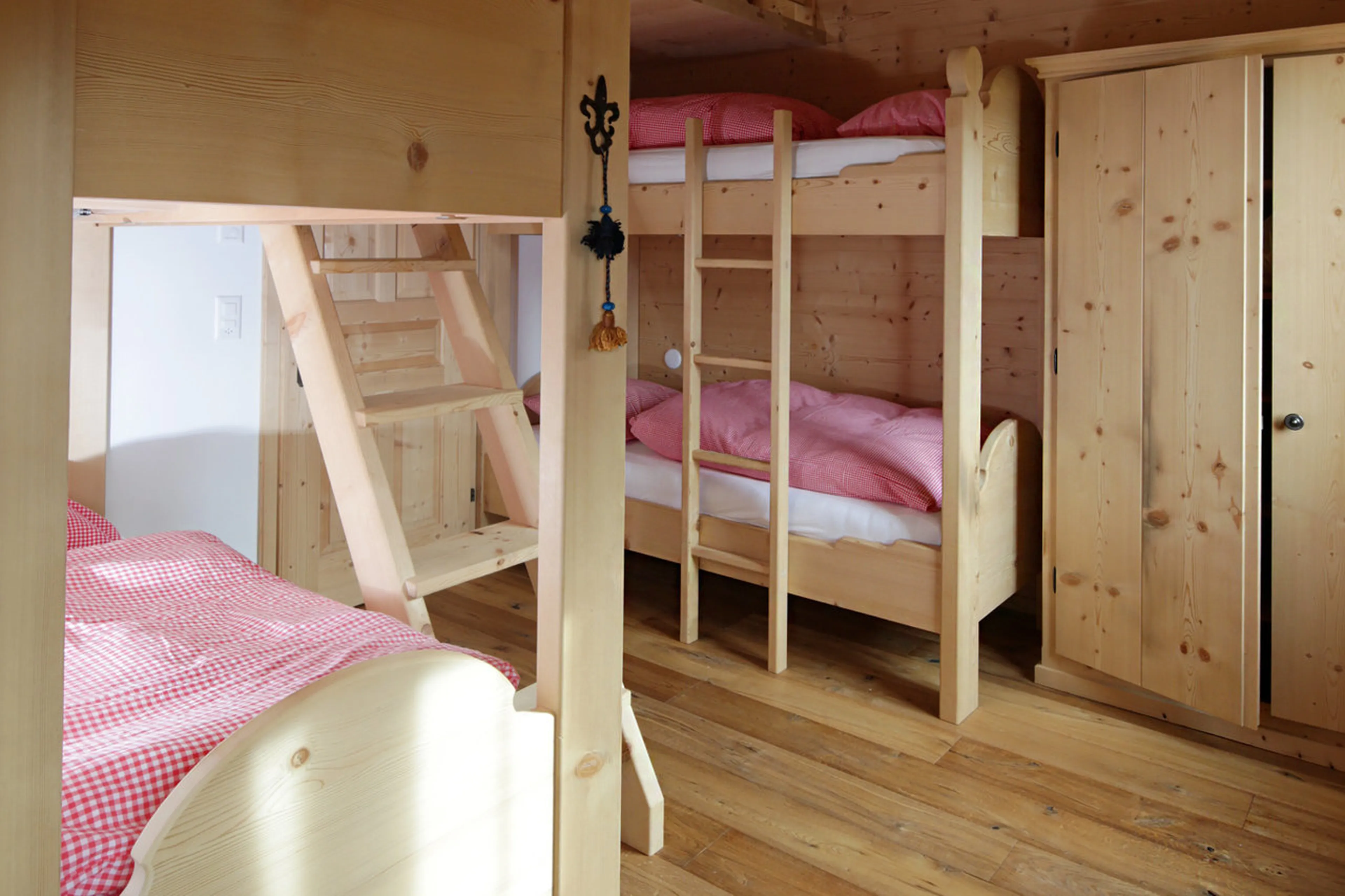 Bedroom with two bunk beds in Chalet Luegisland in Klosters