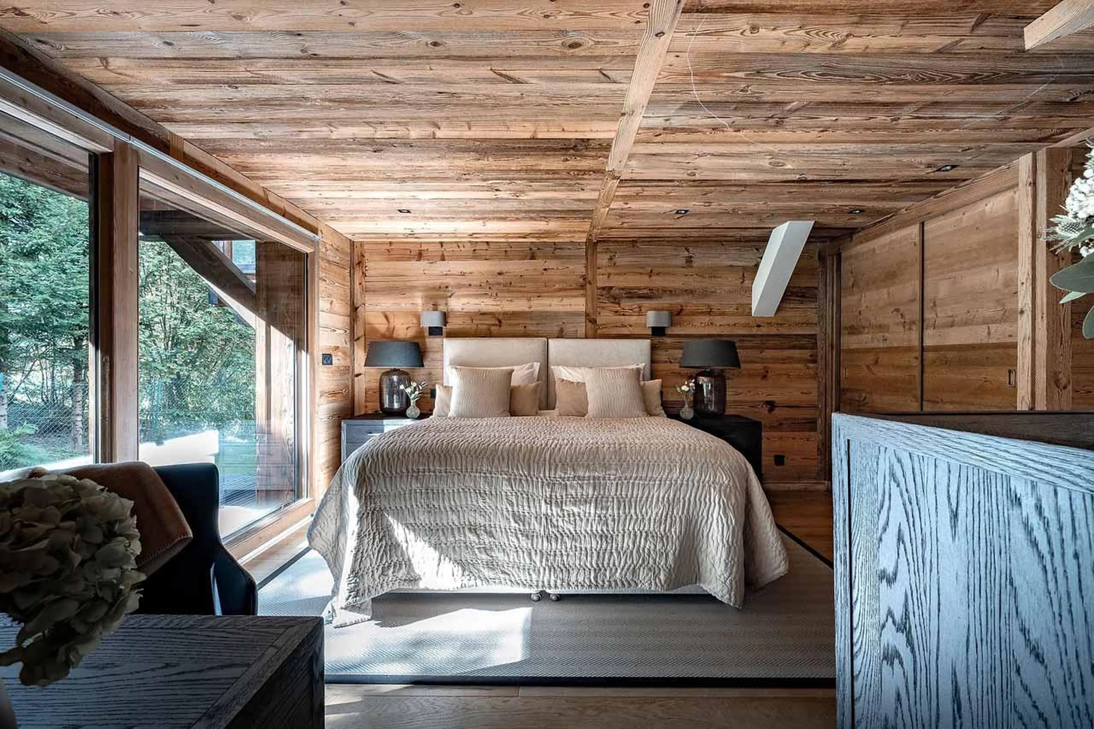Double bedroom with sliding glass doors in Chalet Lupa, Chamonix